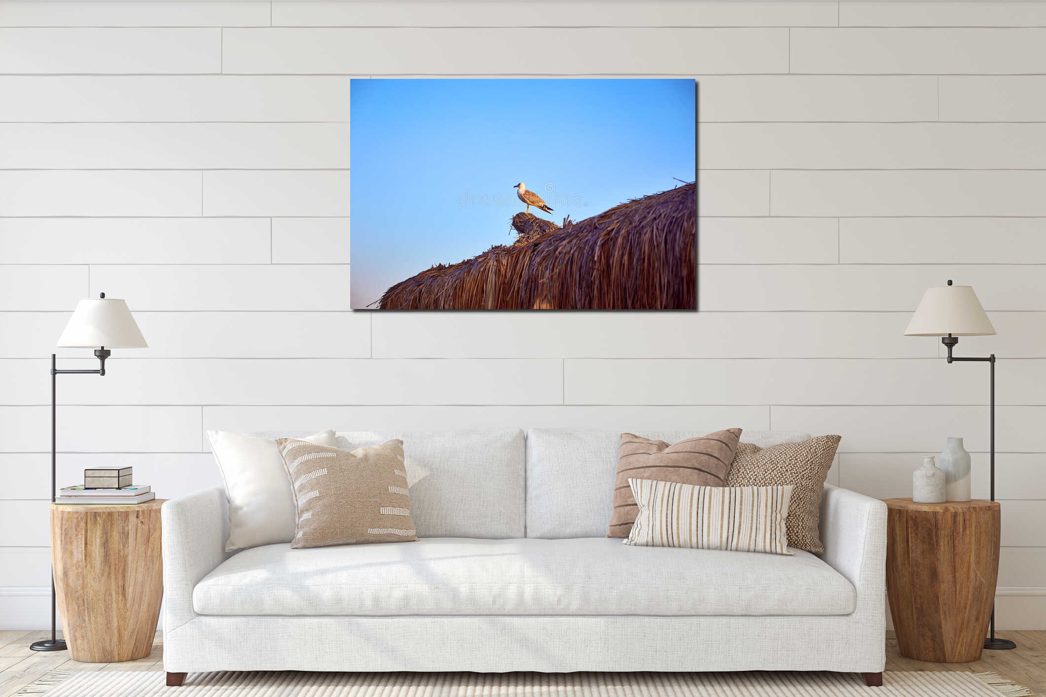 Seagull sits on the roof of a bungalow at sea interior mockup