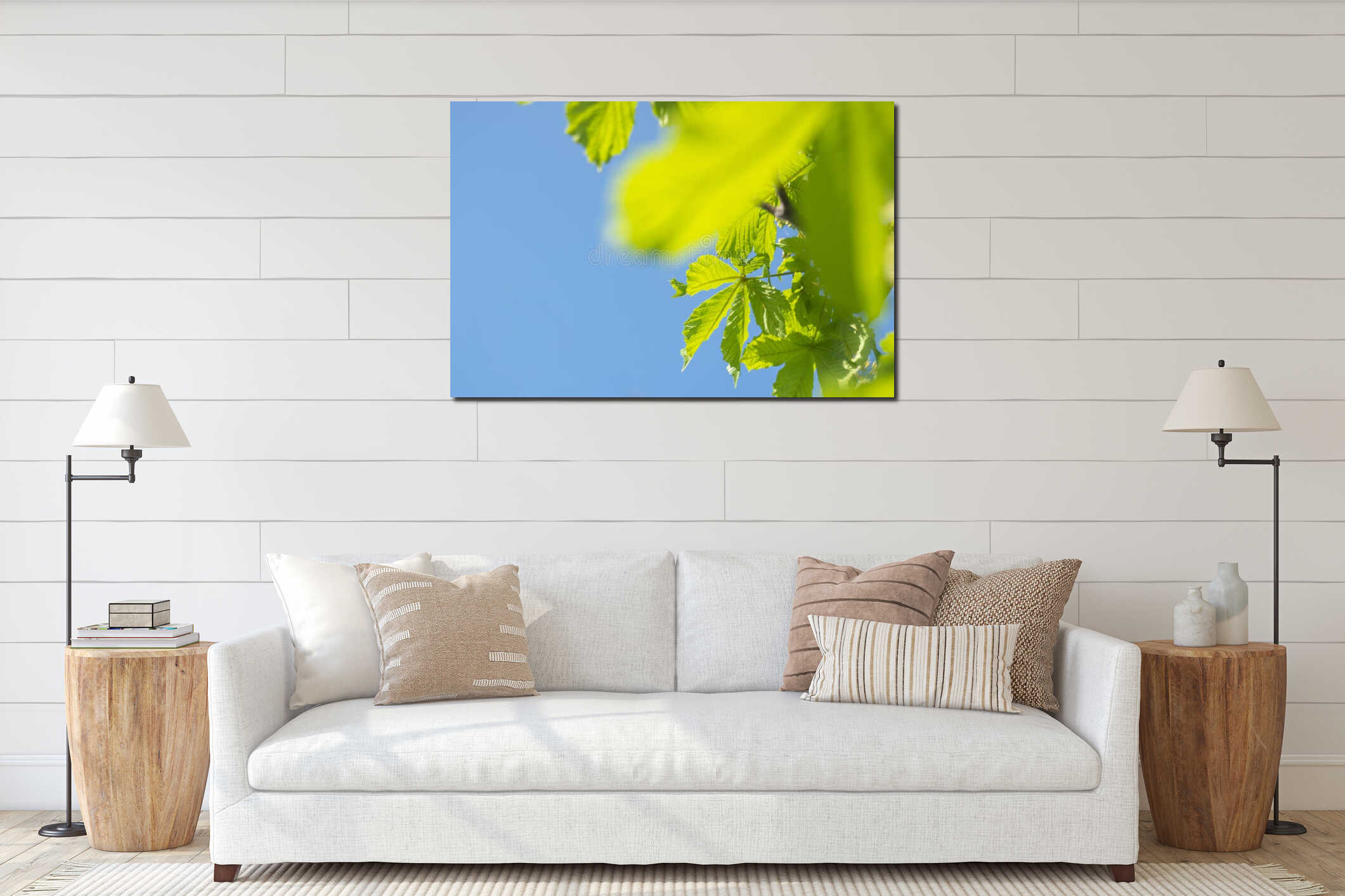 Fresh bright green chestnut leaves on a blue sky. Sunny summer day. Copy space interior mockup