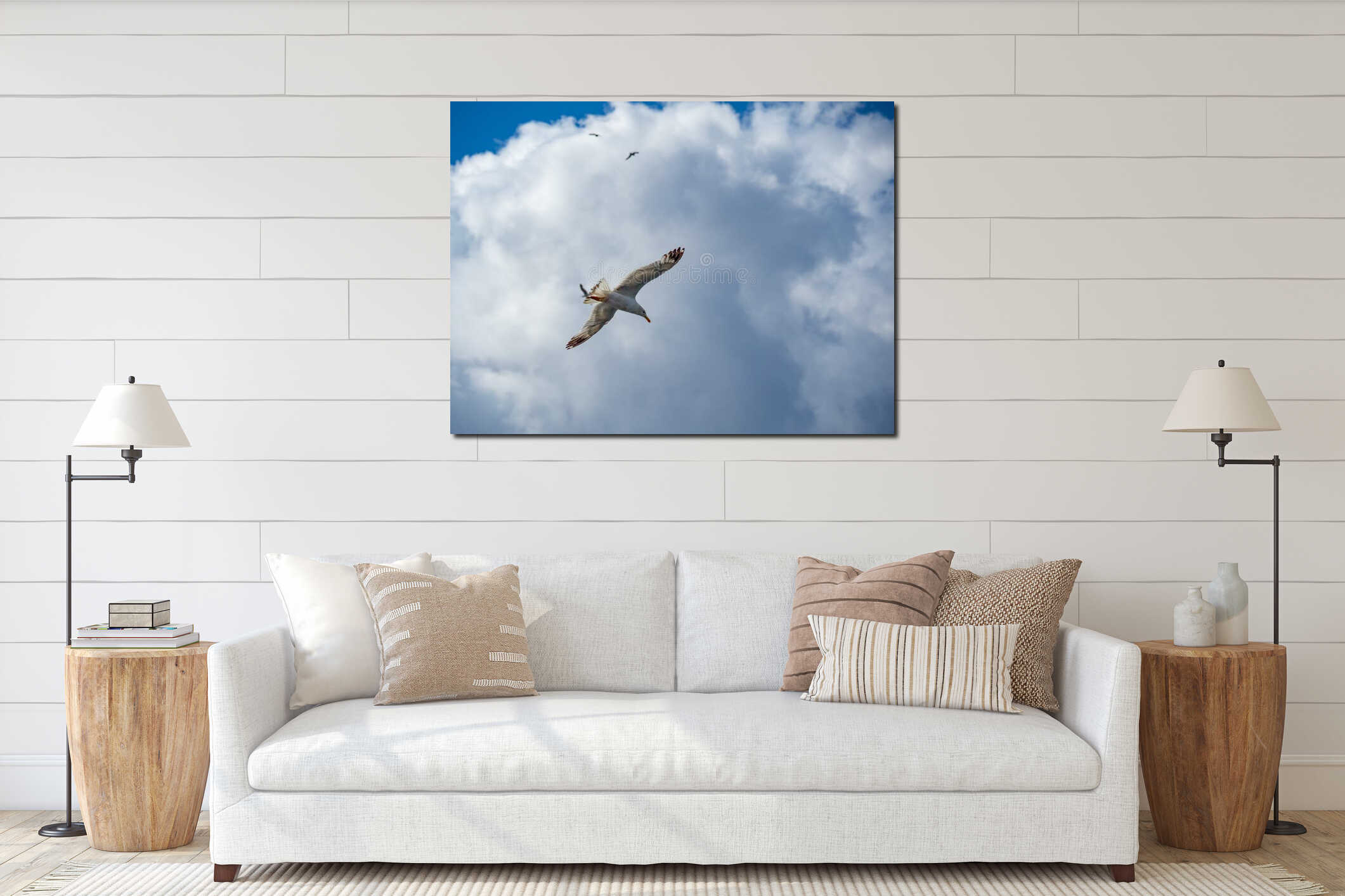 Seagull flying front of cloudy sky interior mockup