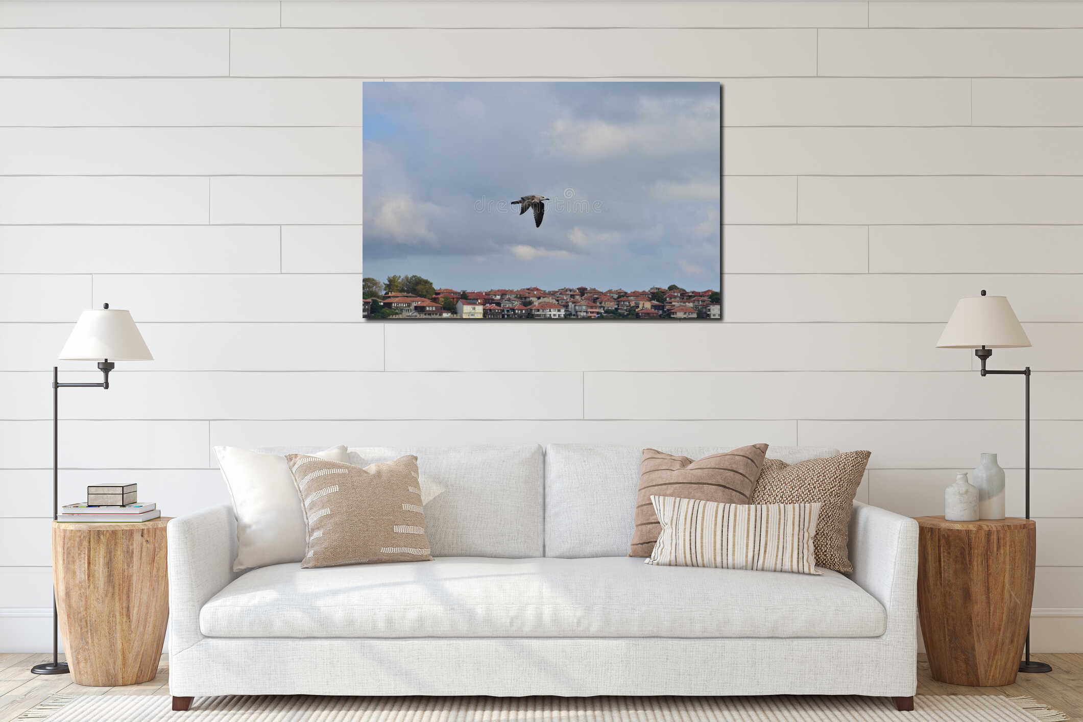 Seagull flying in the sky over houses interior mockup