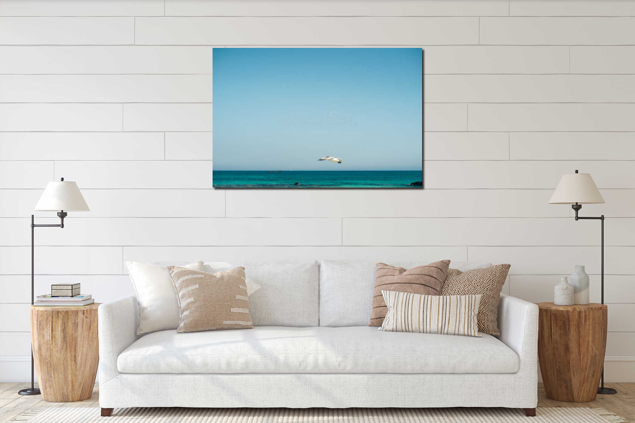 Single seagull flying, blue sky in background interior mockup