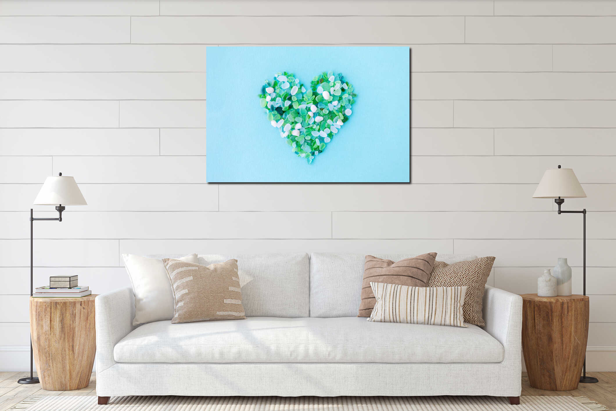 sea glass pieces in the shape of a heart on blue background interior mockup