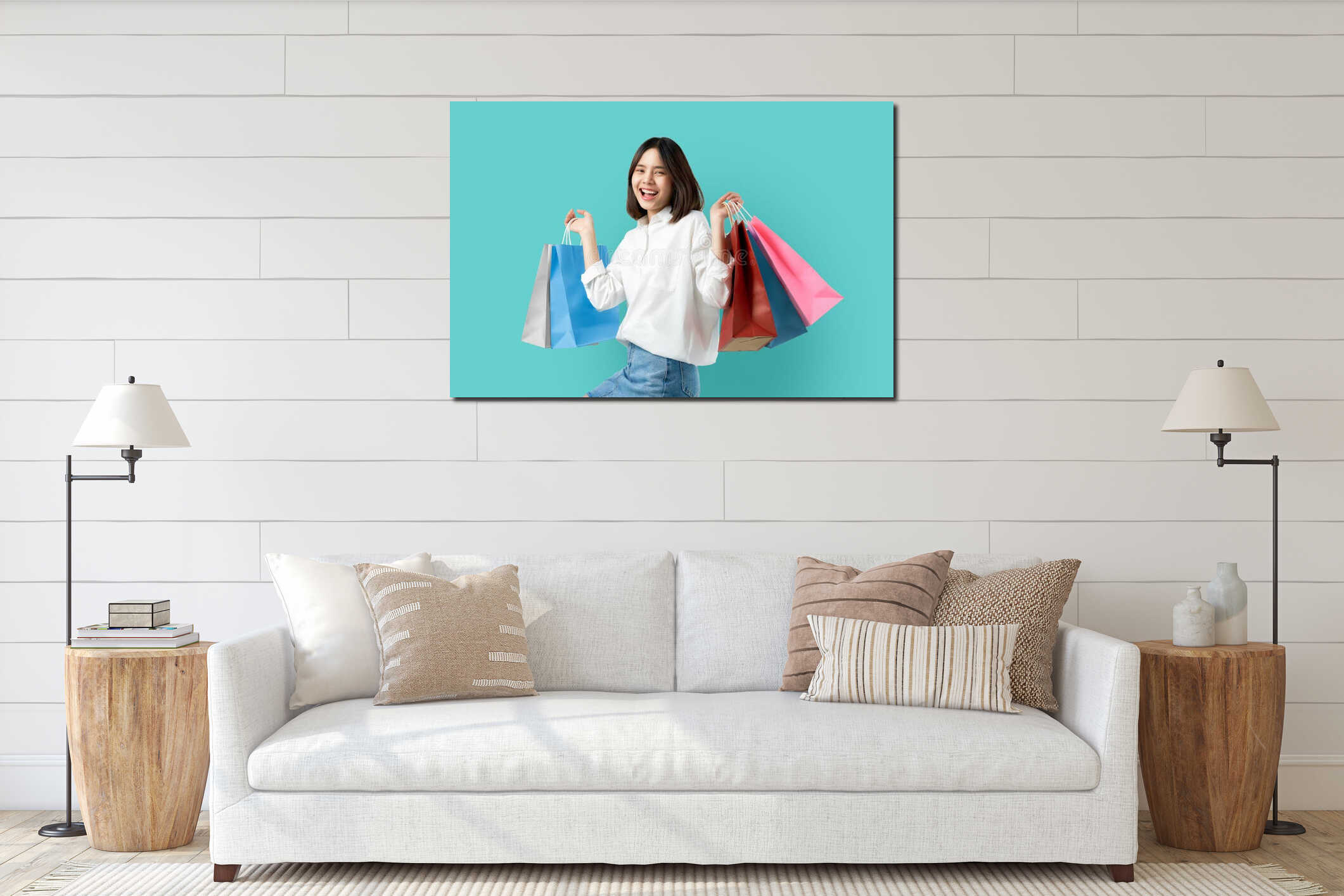 Portrait of young smiling asian woman casual clothes holding multicolored shopping bags on light blue background. interior mockup
