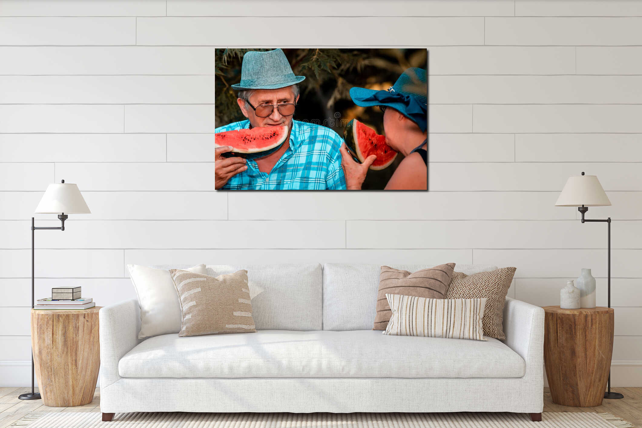 Happy senior loving couple eating watermelon on a picnic interior mockup