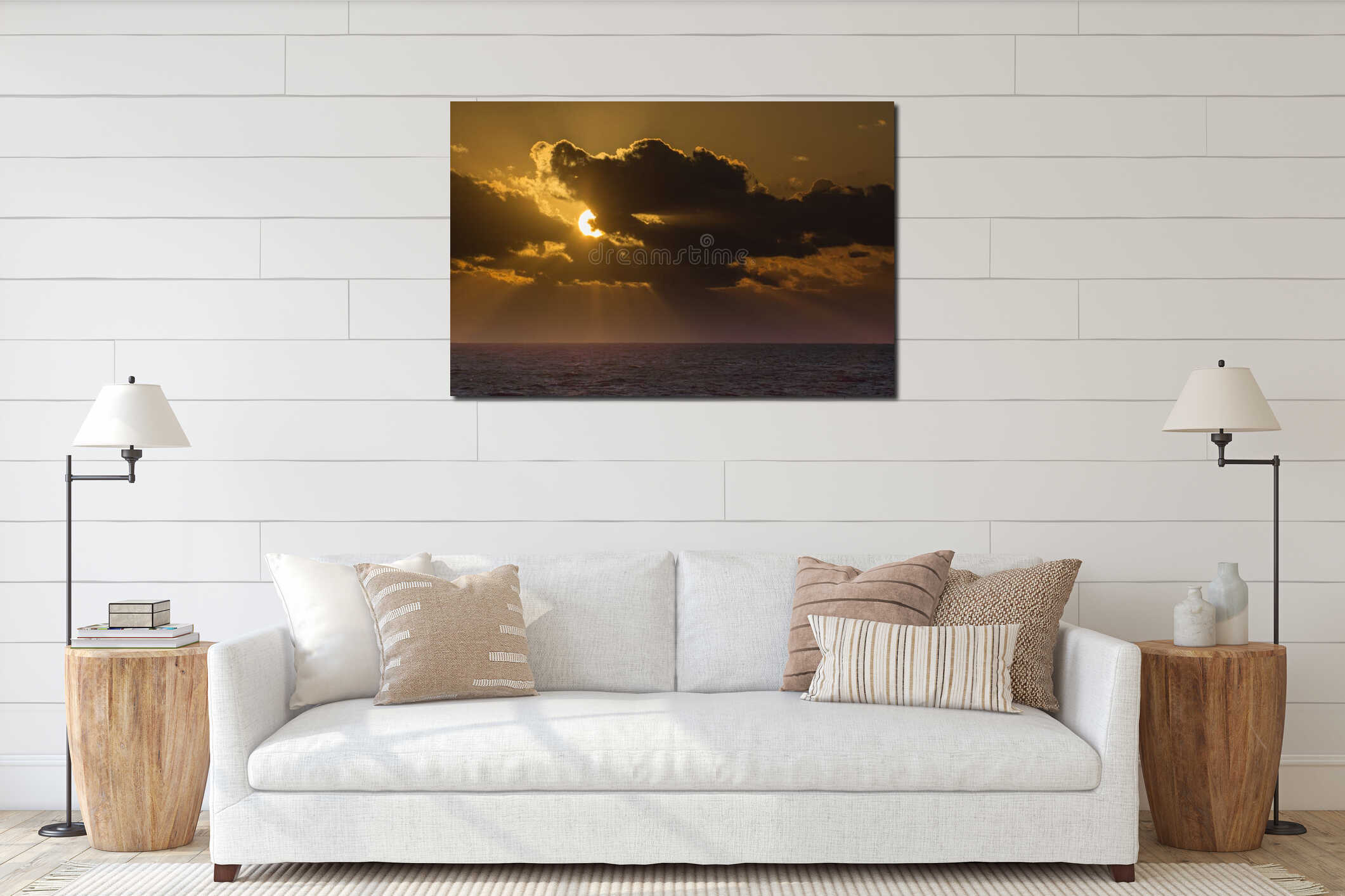 Setting sun hides behind the clouds over a purple Caribbean Sea interior mockup
