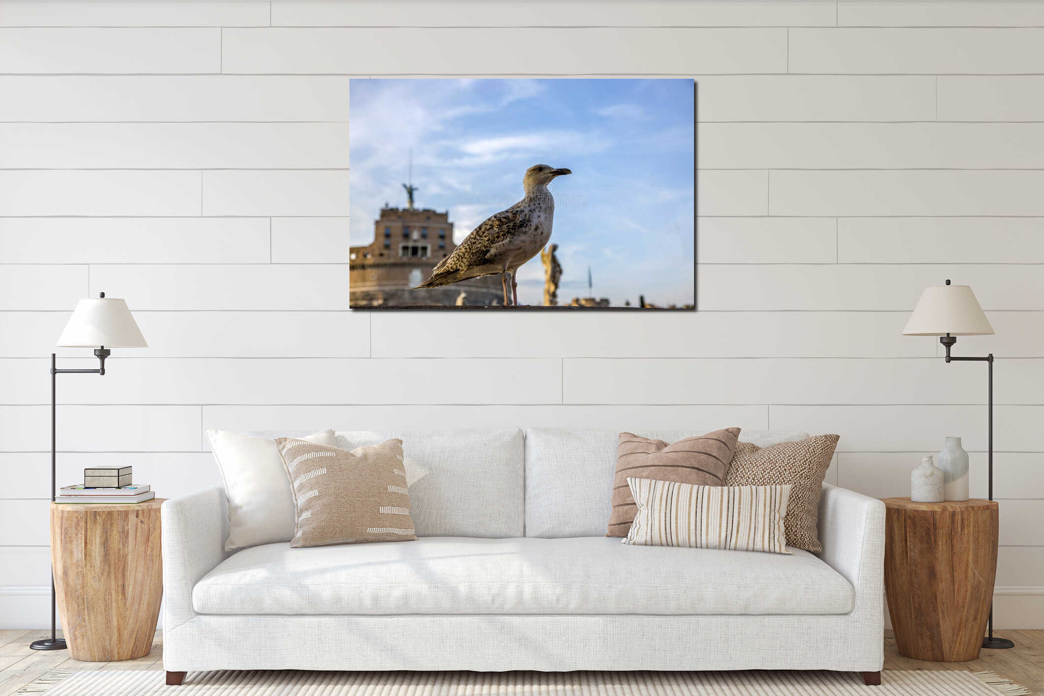 A seagull on a fence against the backdrop of the Castle of the Holy Angel in Rome interior mockup
