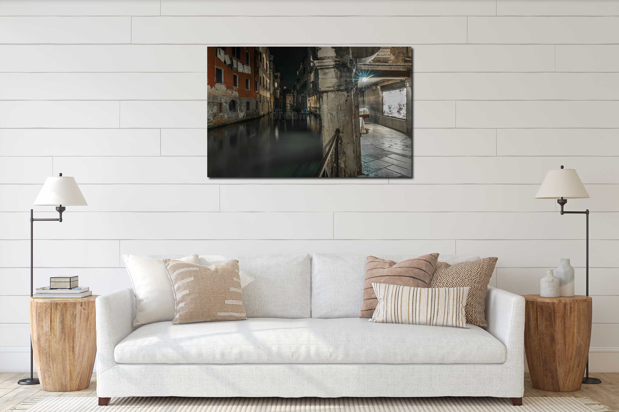 Horizontal shot of a canal between ancient Italian buildings at night time in Venice, Italy interior mockup