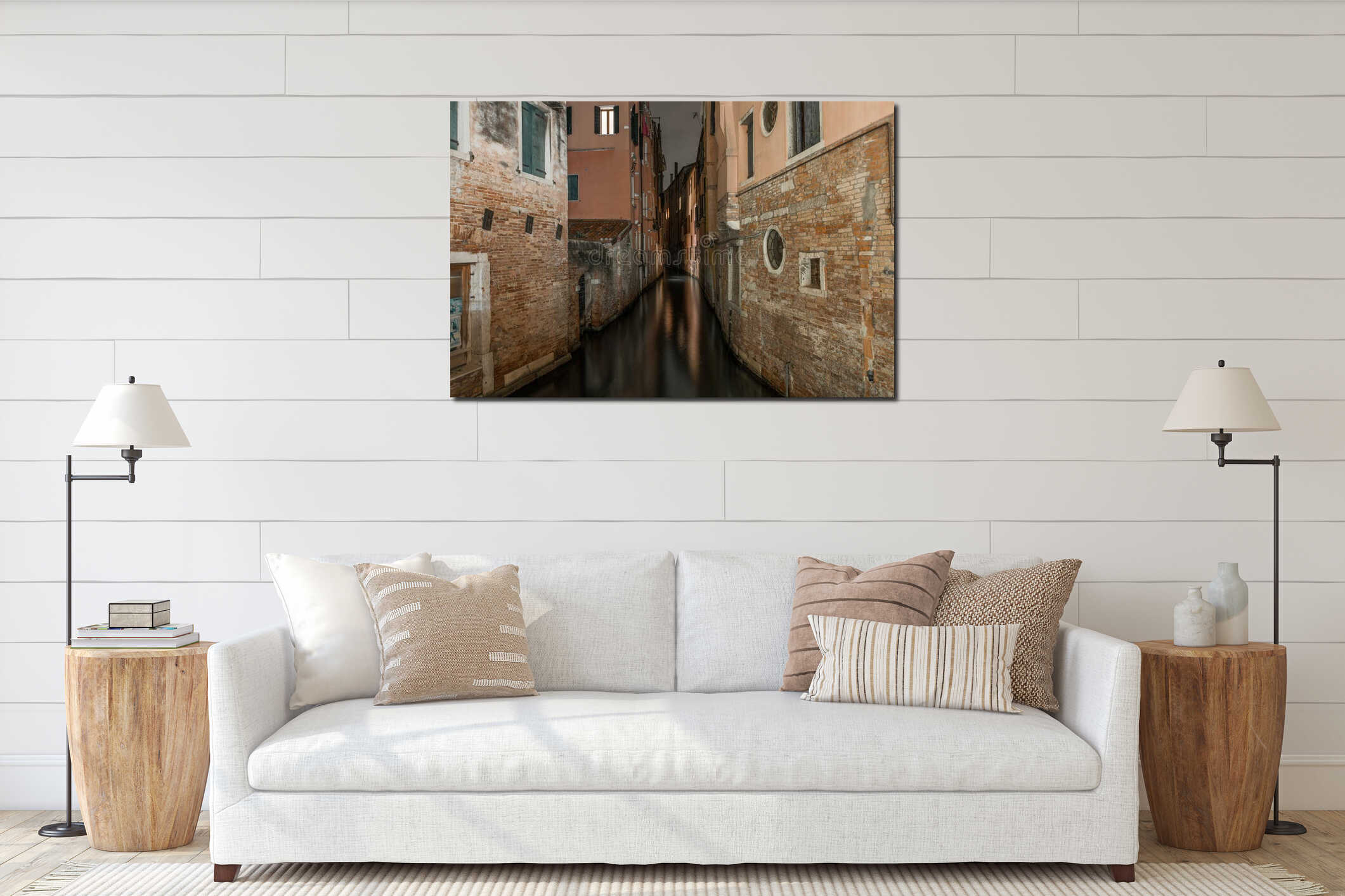 Horizontal shot of a canal between the old buildings in Venice, Italy during nighttime interior mockup