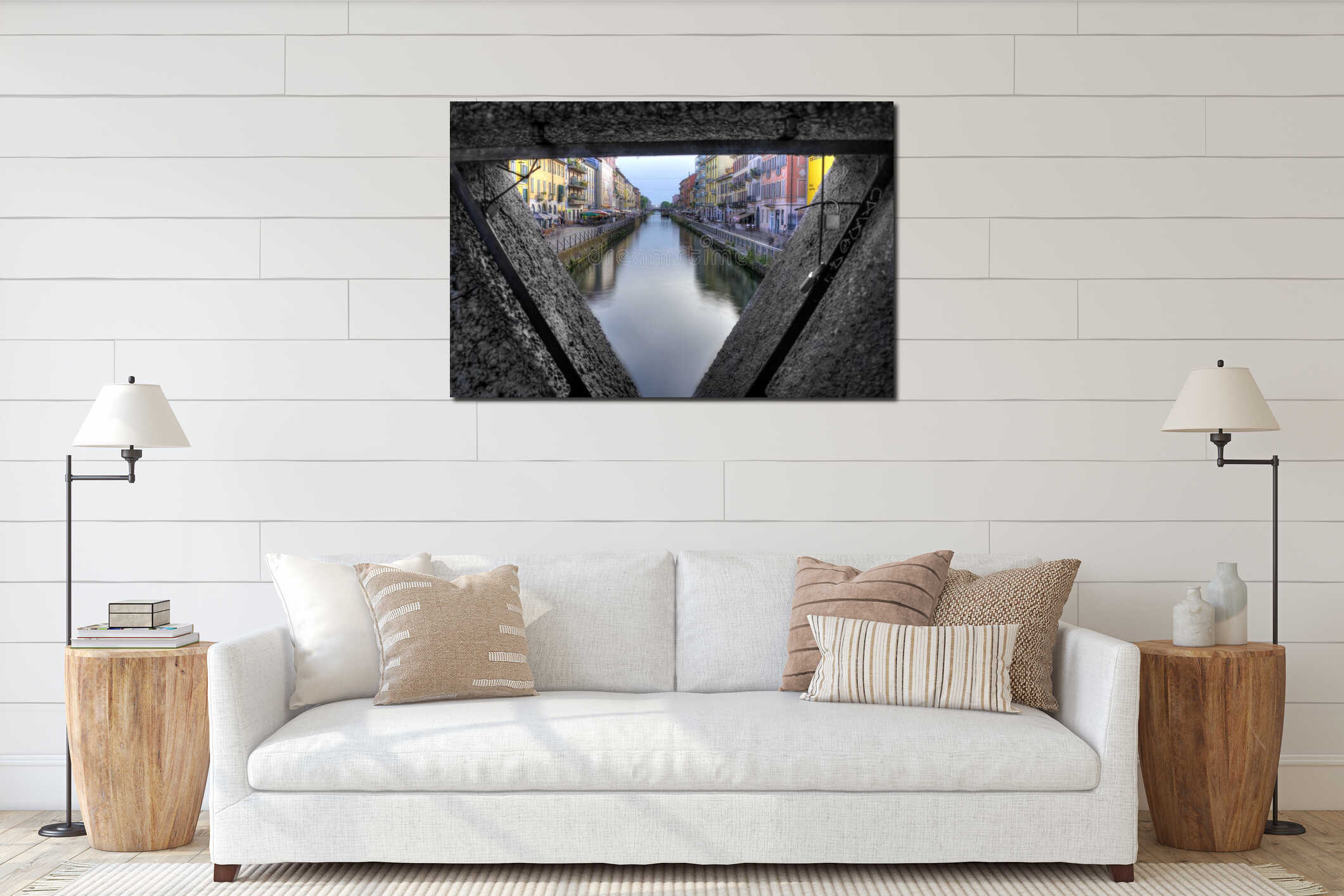 Horizontal shot of Navigli Canal in Milan, Italysurrounded by colorful buildings under clear sky interior mockup