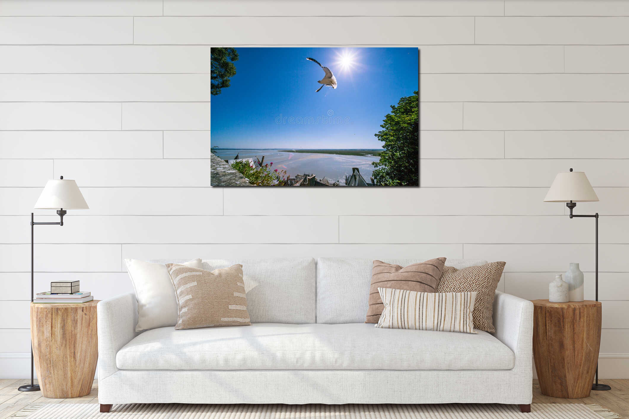 Seagull Flying in front of the Sun in Mont Saint-Michel Abbey on a Sunny Summer Day in Normandy France interior mockup