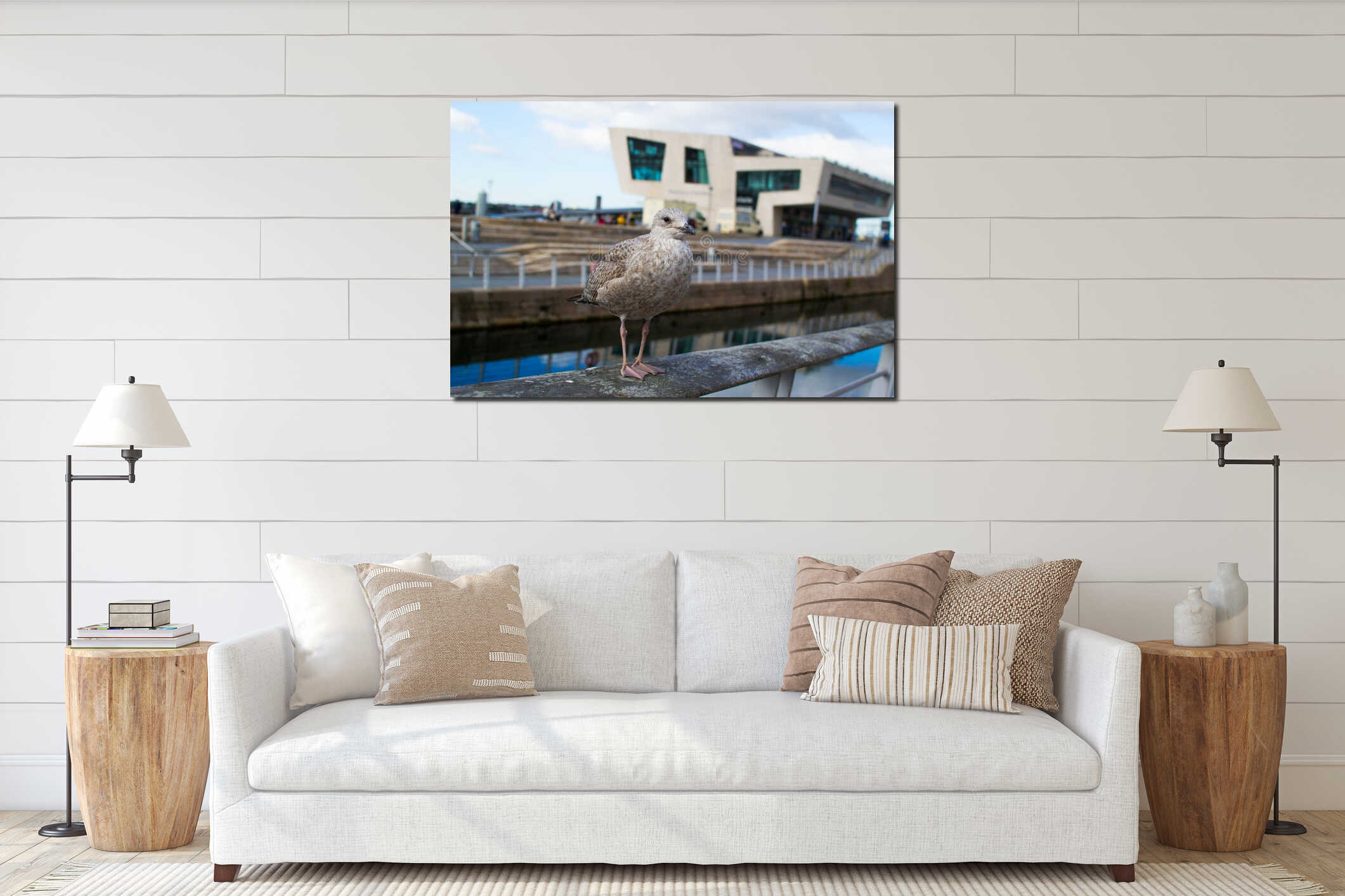 Close up of a grey seagull with the Museum of Liverpool at the background in Pier Head, Liverpool, England UK interior mockup