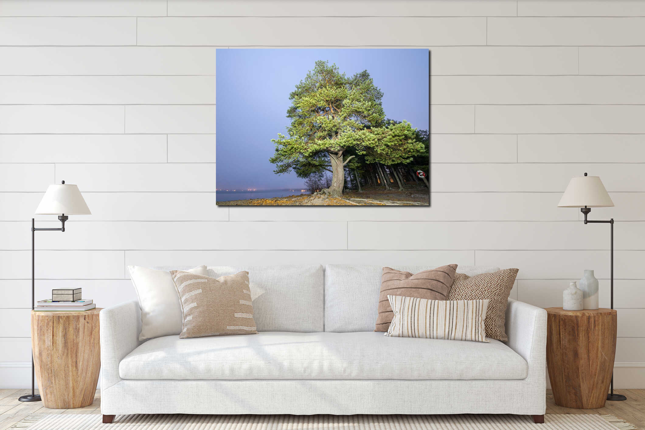 Big wide pine tree stands at the coast of scandinavian lake, foggy dark evening, house lights very long away at another side of interior mockup