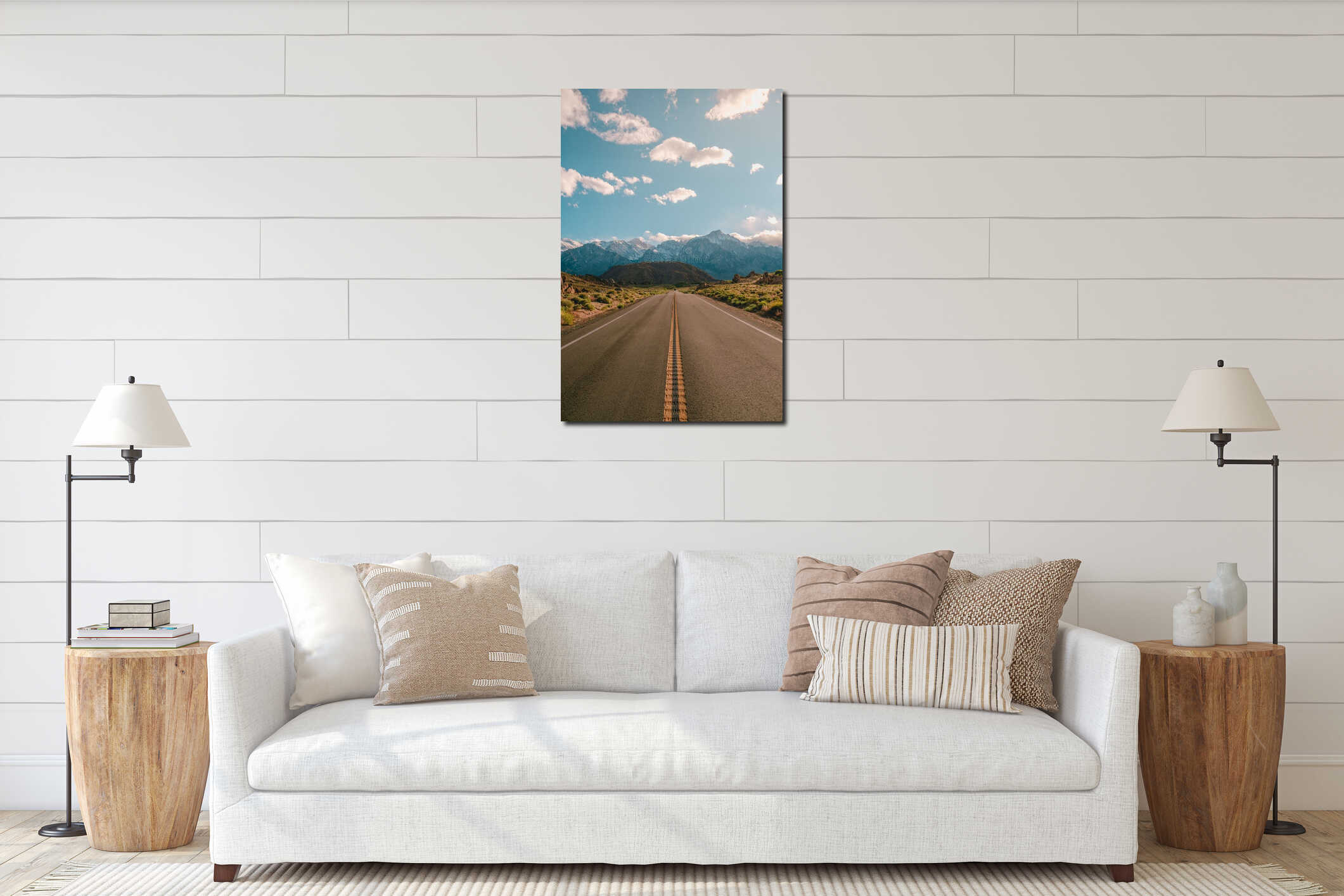 Vertical shot of a road with the magnificent mountains under the blue sky captured in California interior mockup