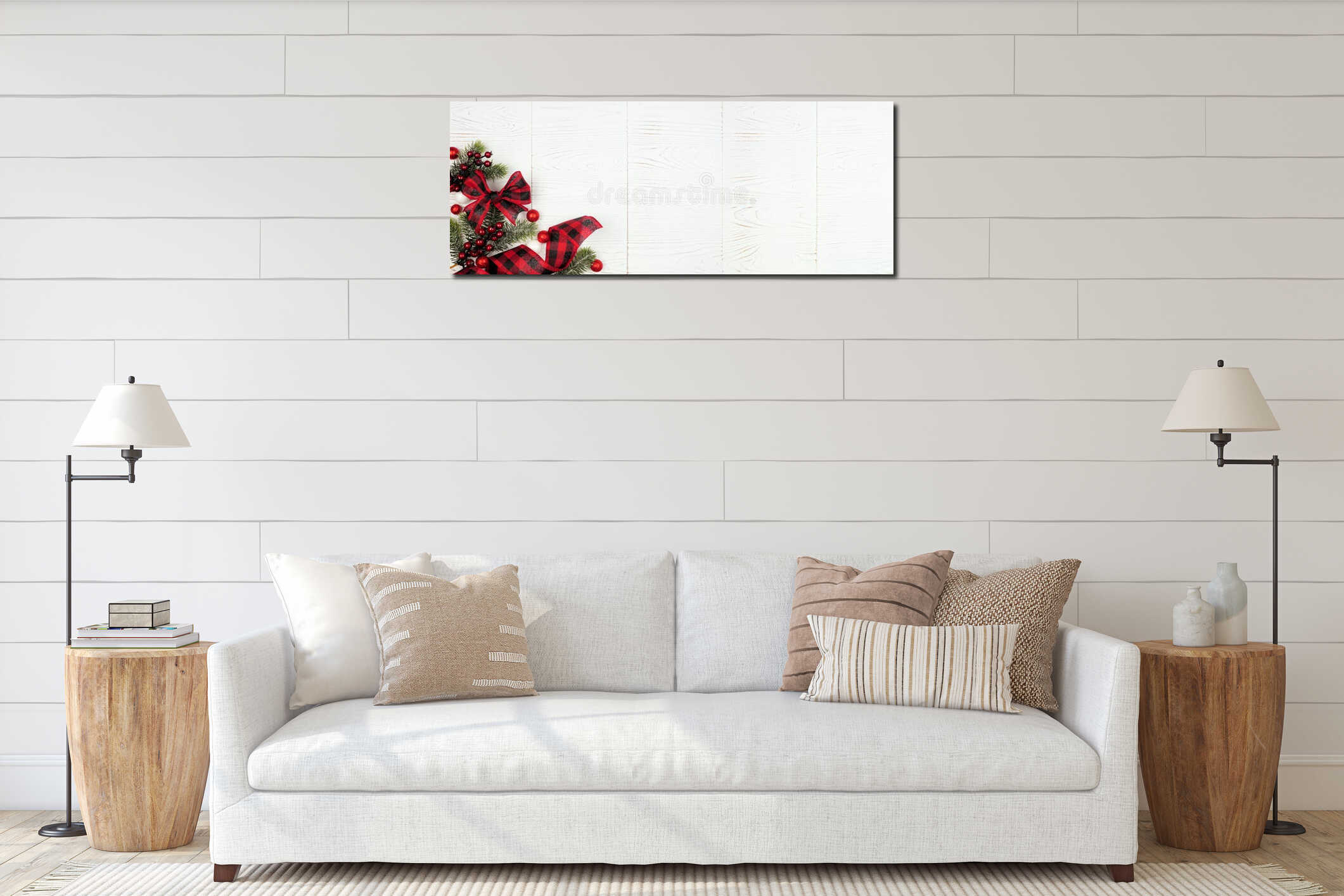 Christmas corner border banner of ornaments, branches and red and black checked buffalo plaid ribbon, above view on a white wood b interior mockup