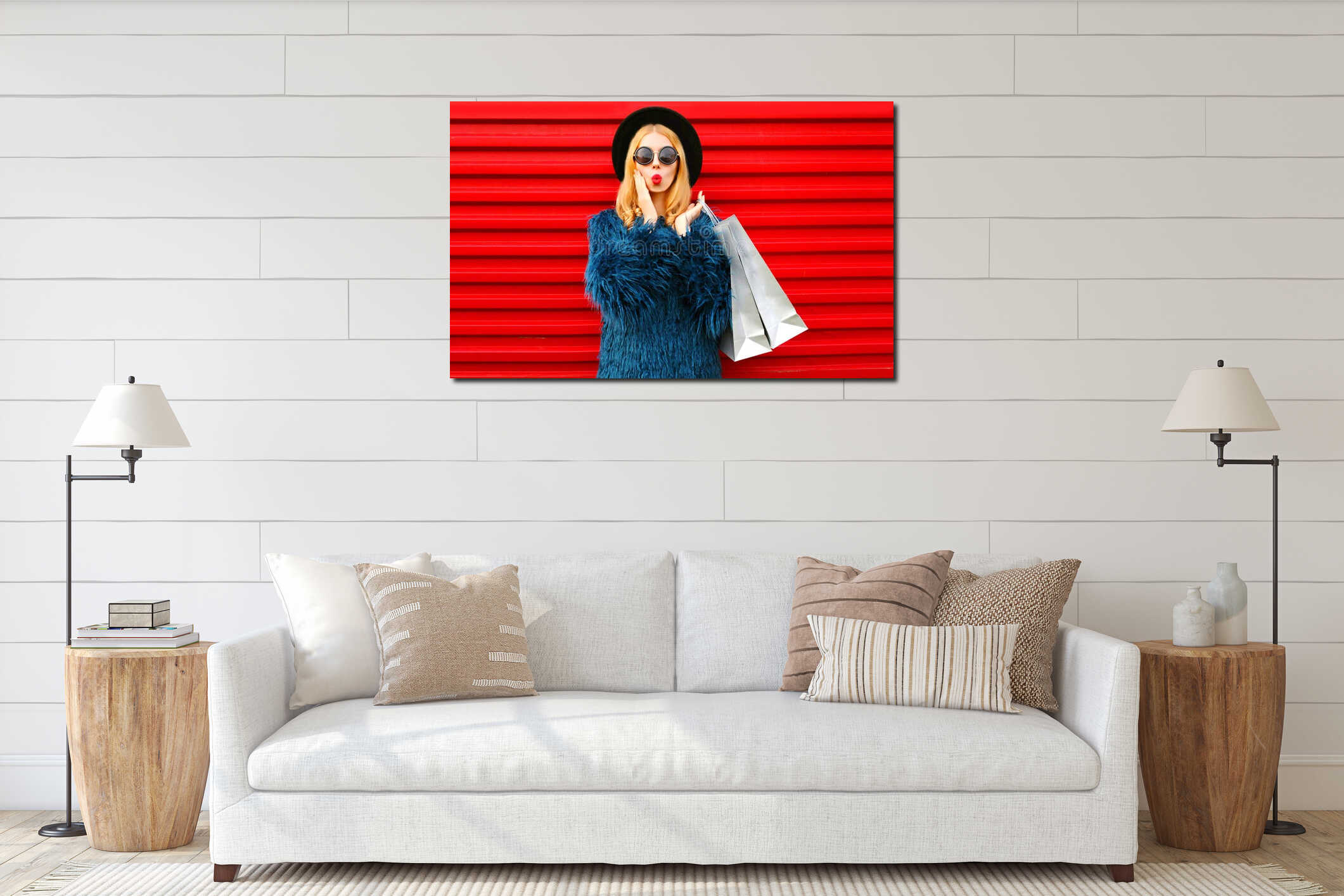 Portrait shocked young woman with shopping bags wearing blue faux fur coat, black round hat and sunglasses posing over red wall interior mockup