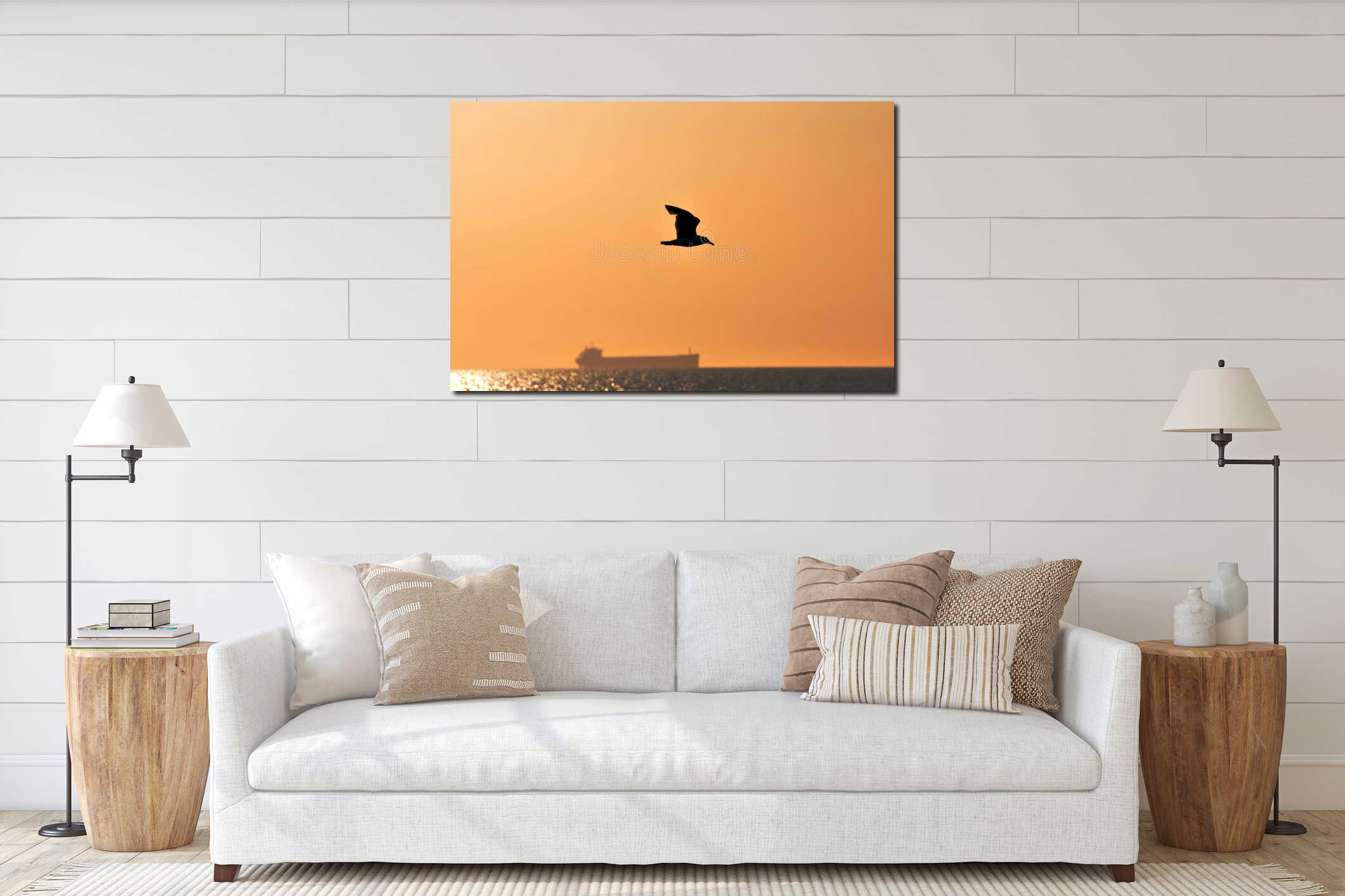 A seagull flying in front of a sunset interior mockup