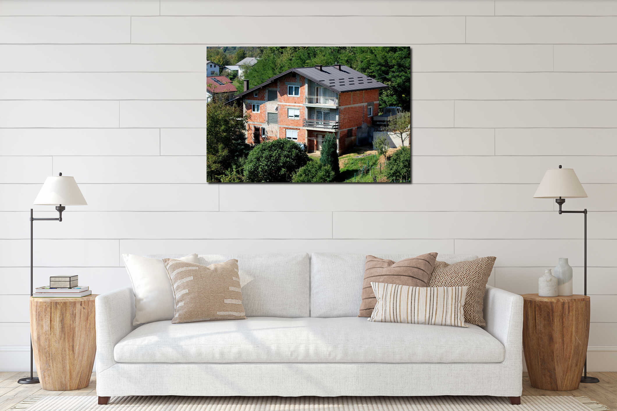 Unfinished large red building blocks suburban family house with new roof surrounded with dense trees interior mockup