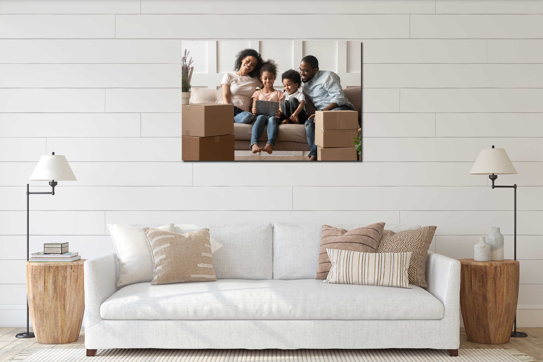 Happy black family sitting in living room with computer. interior mockup