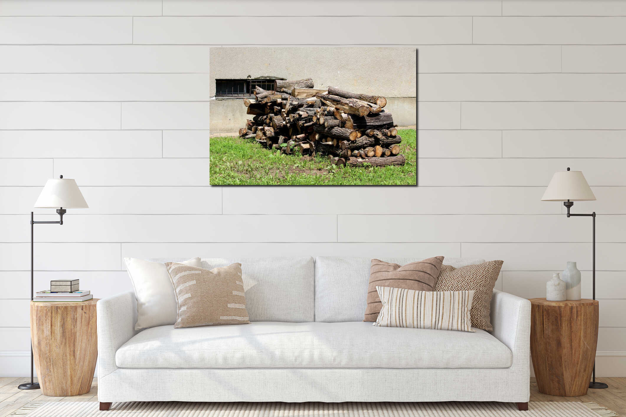 Pile of very old dried stacked firewood prepared for cold winter days in front of dilapidated family house dark grey wall interior mockup
