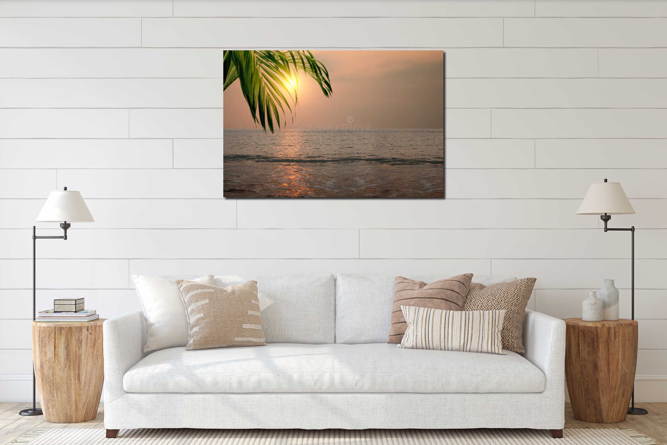 Sandy beach with green palm leaf and blue ocean interior mockup