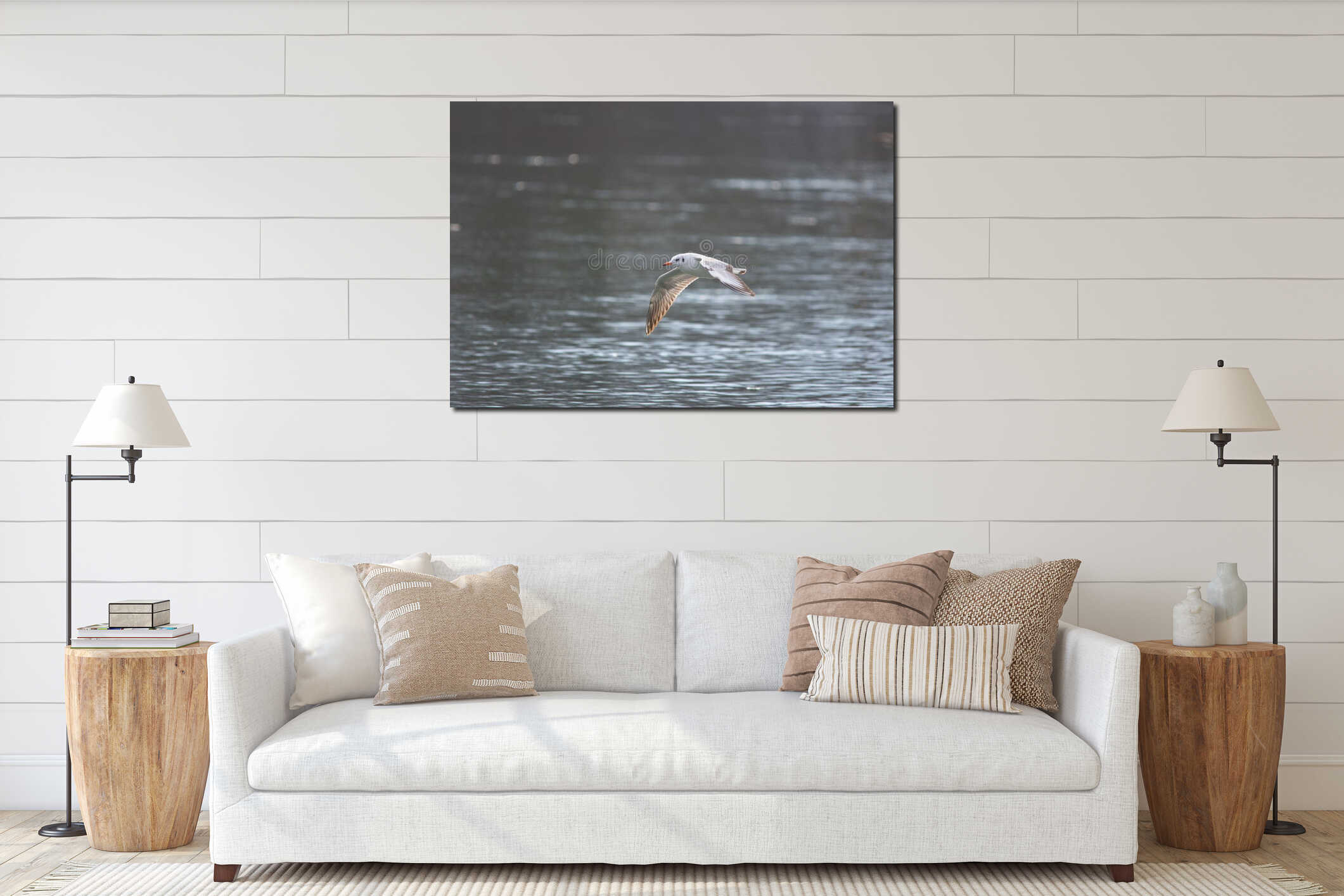 Seagull flying over the river, in winter. Selective focus interior mockup