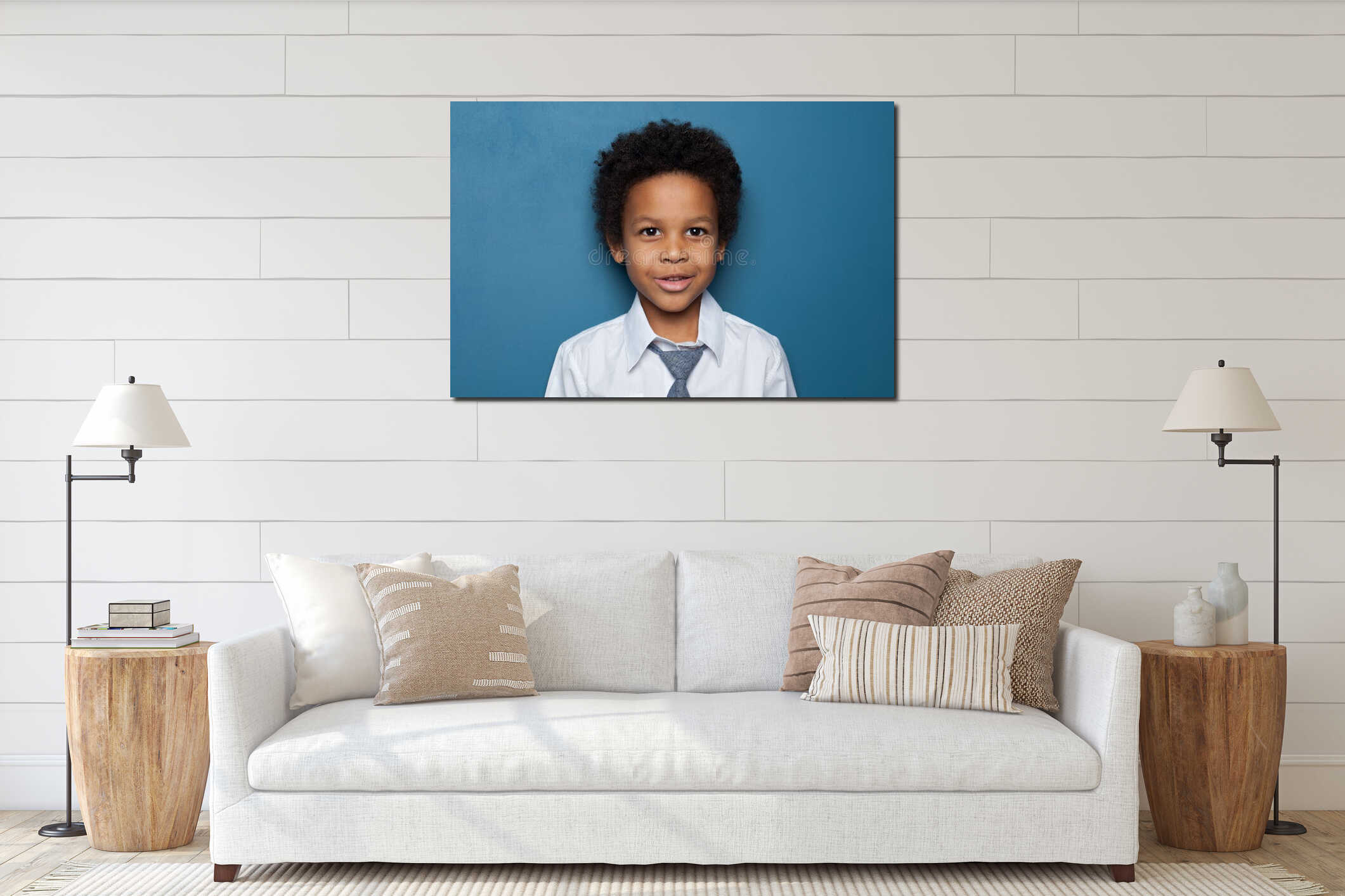 Cute curious African American child schoolboy student 6 years old on blue backgroung. Black kid boy portrait interior mockup