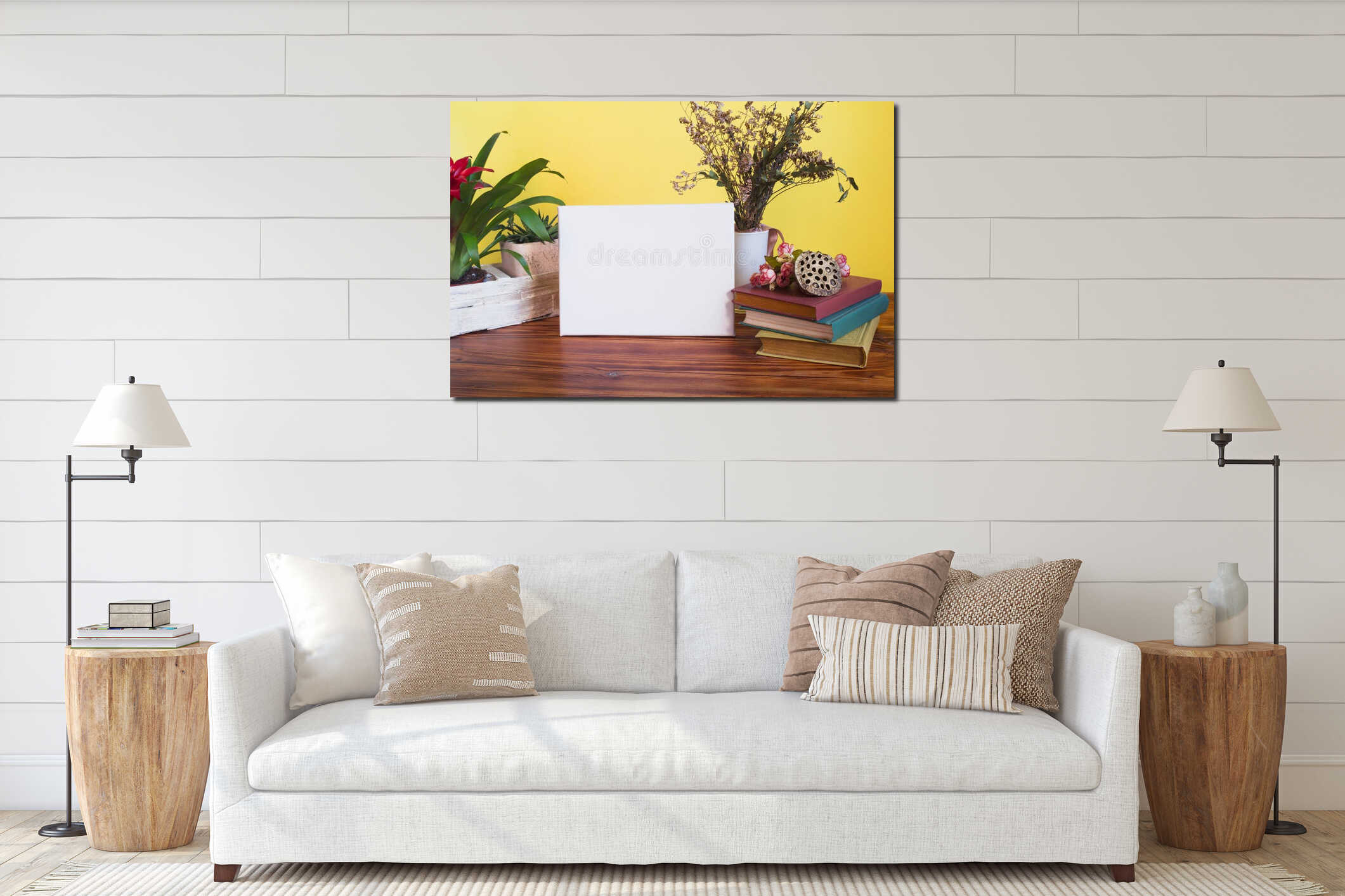 Mockup poster frame in bright spring interior. White empty canvas, books and flowers on table, yellow wall on background. interior mockup