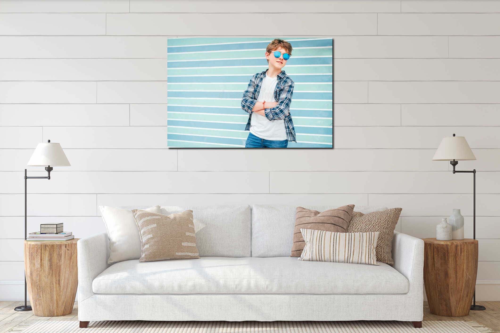 Fashion portrait of caucasian blonde hair 12 year old teenager boy dressed t-shirt and checkered shirt in blue sunglasses posing interior mockup