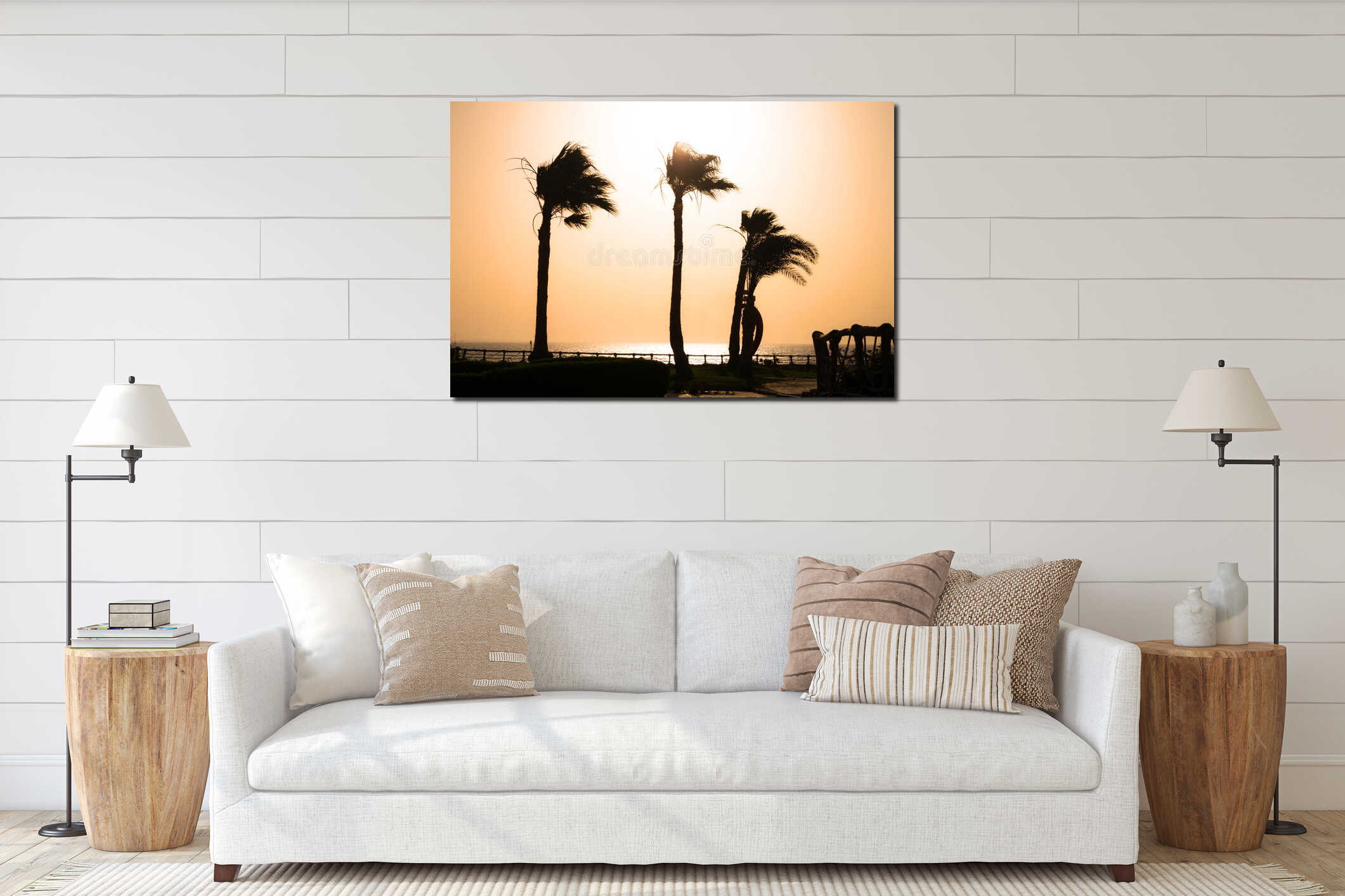 Evening landscape of the tropical sea shore. Silhouettes of three palm trees stagger from the wind. Travel concept of sunset on interior mockup