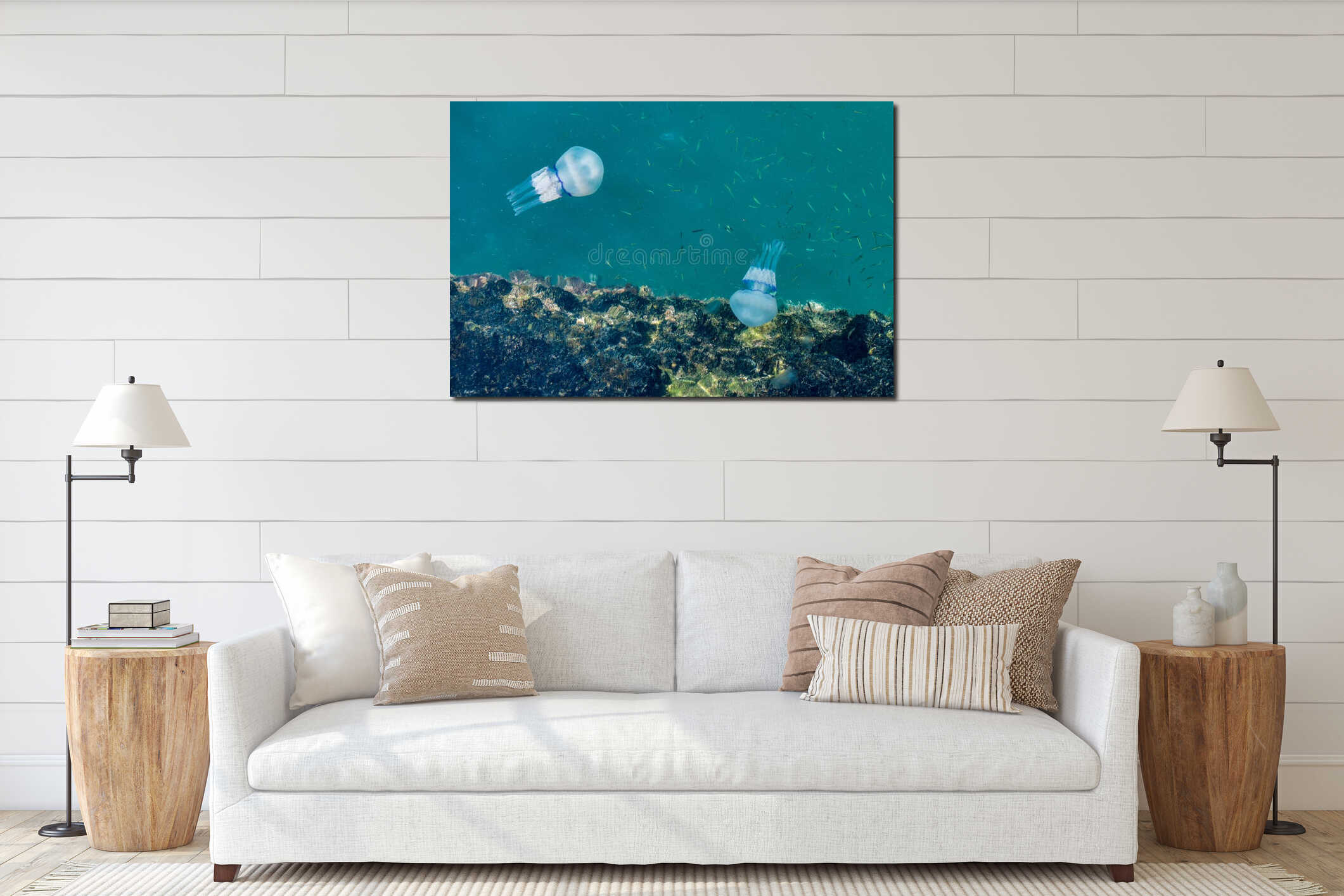 Beautiful glowing blue jellyfish in blue water sea with little fish background interior mockup
