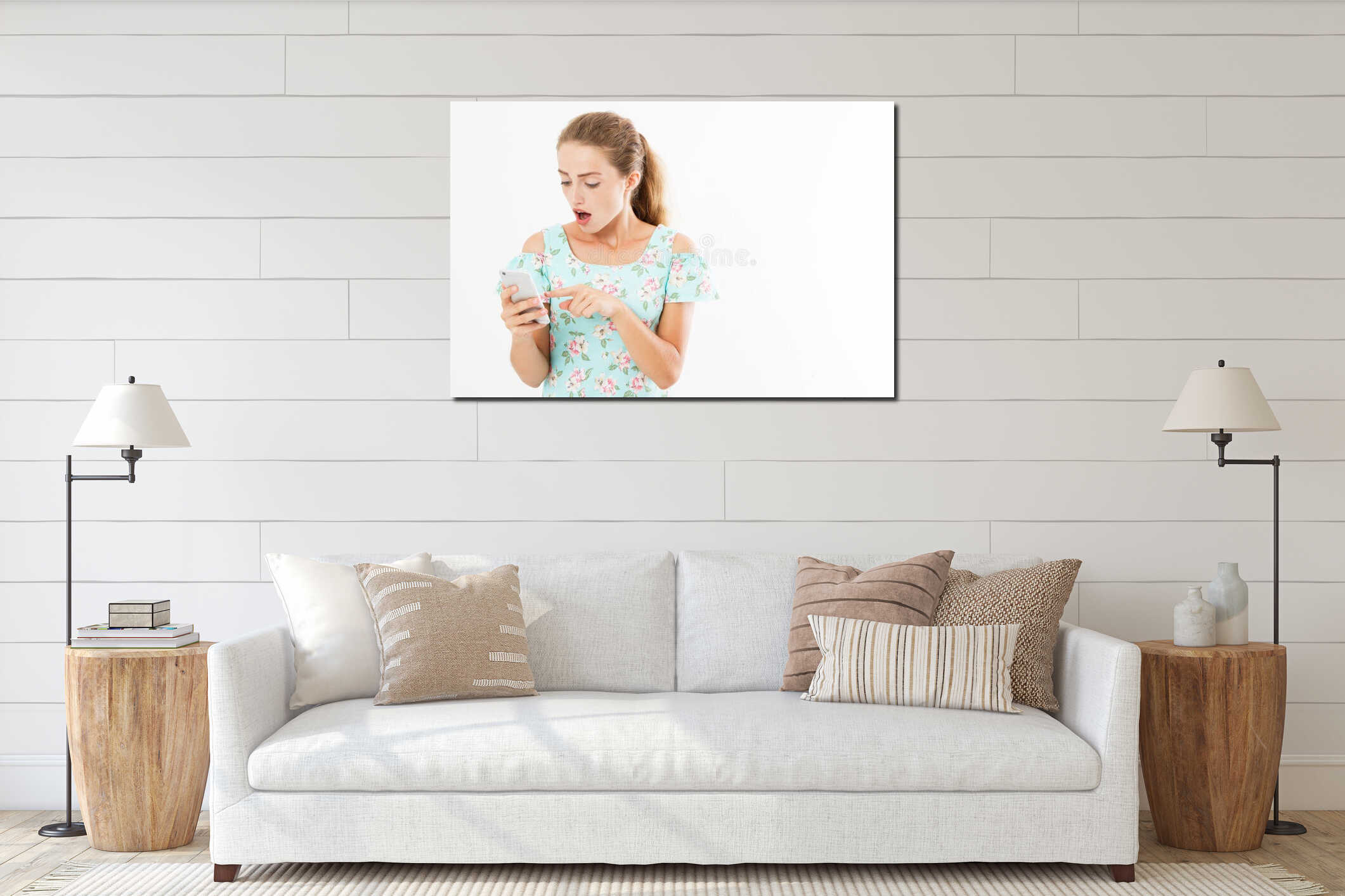 Portrait shocked young girl in dress looking at mobile phone isolated on white background interior mockup