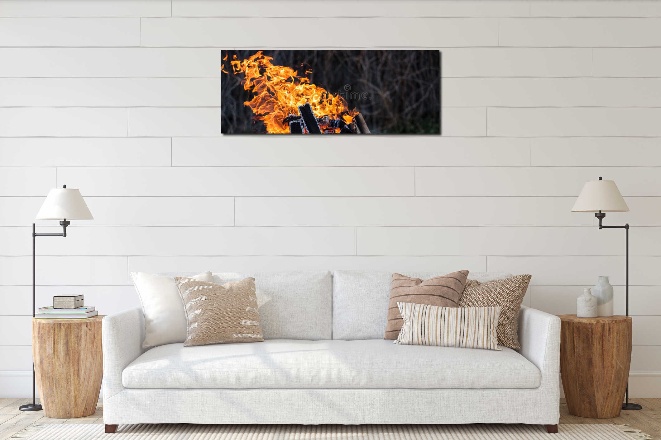 A bright orange flame of fire burns against a dark background. Birch firewood interior mockup