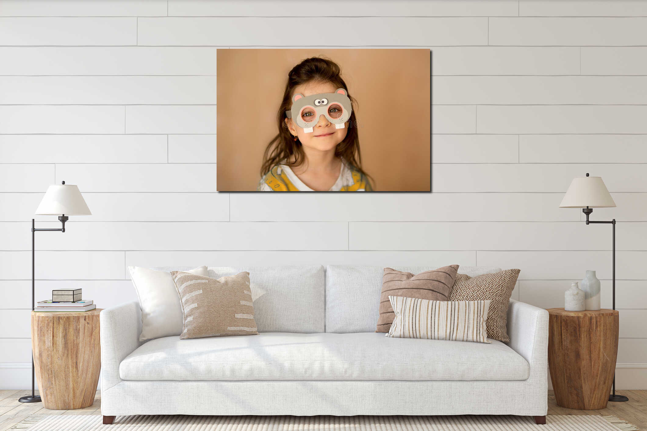 Funny girl with beautiful blue-orange eyes in a cardboard mask in the shape of a hippo plays at home. close portrait interior mockup