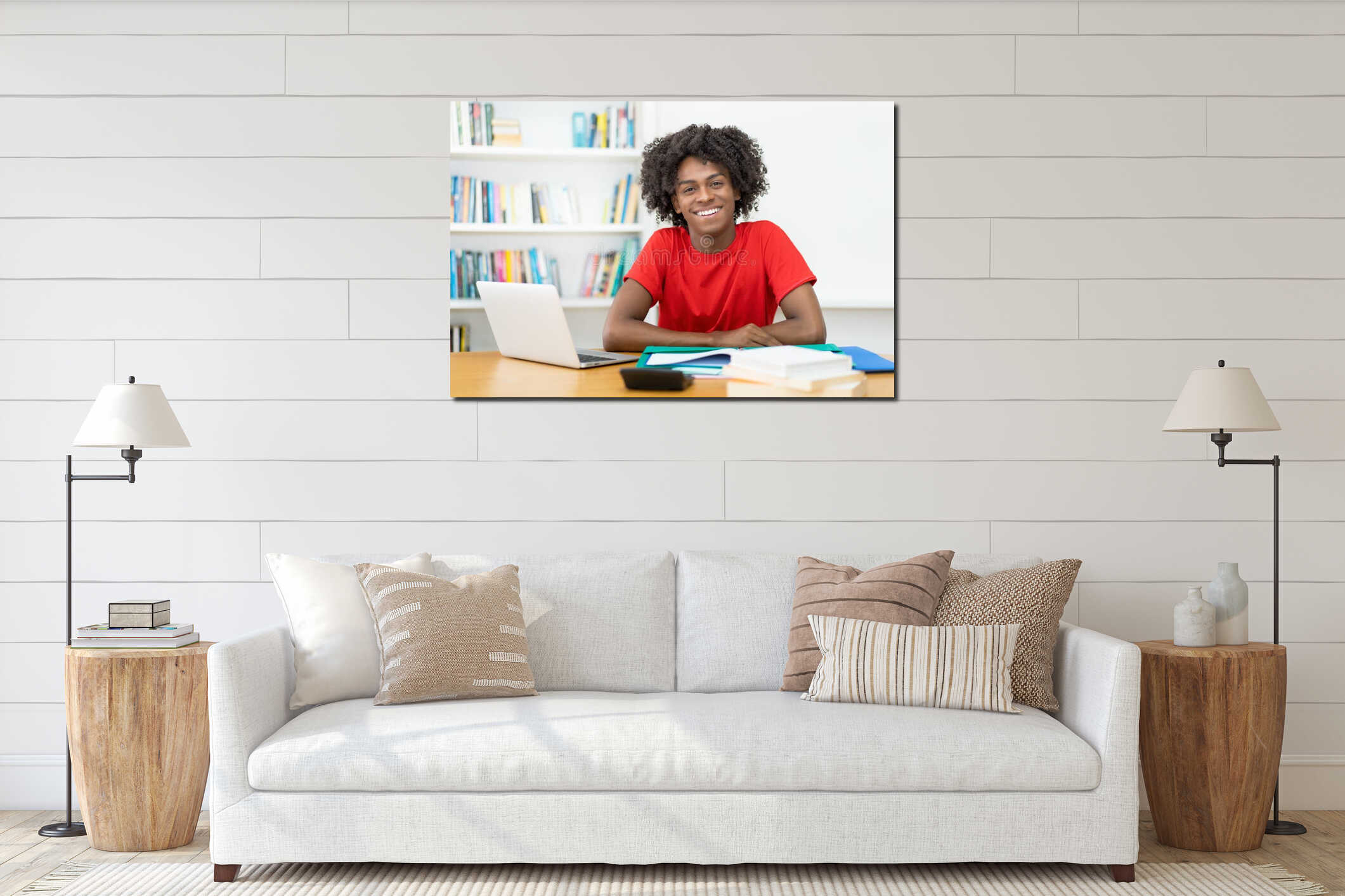 Laughing afro american male student learning at desk interior mockup