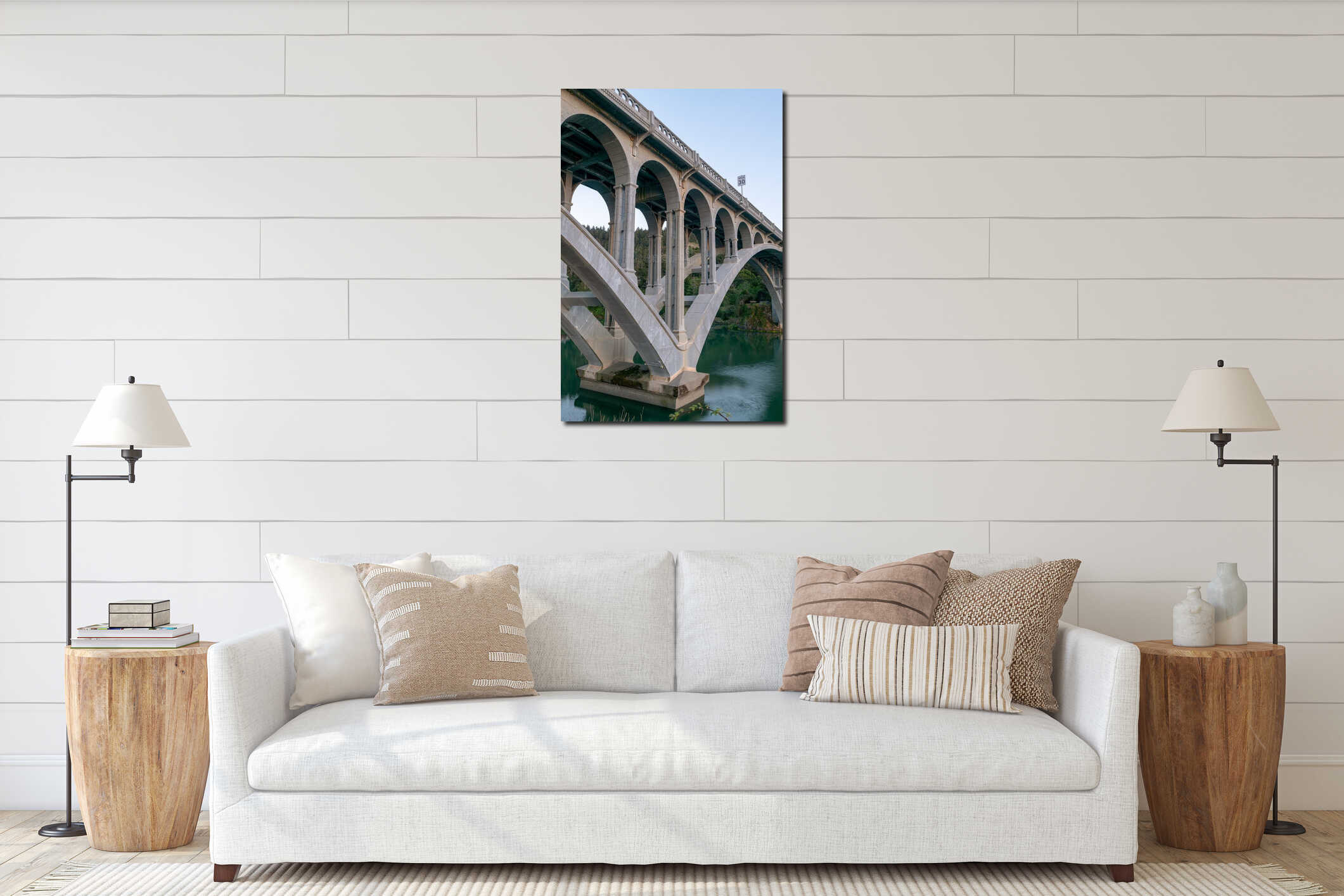 Pilings and arches of the Rogue River bridge in Gold Beach, Oregon at sunset interior mockup