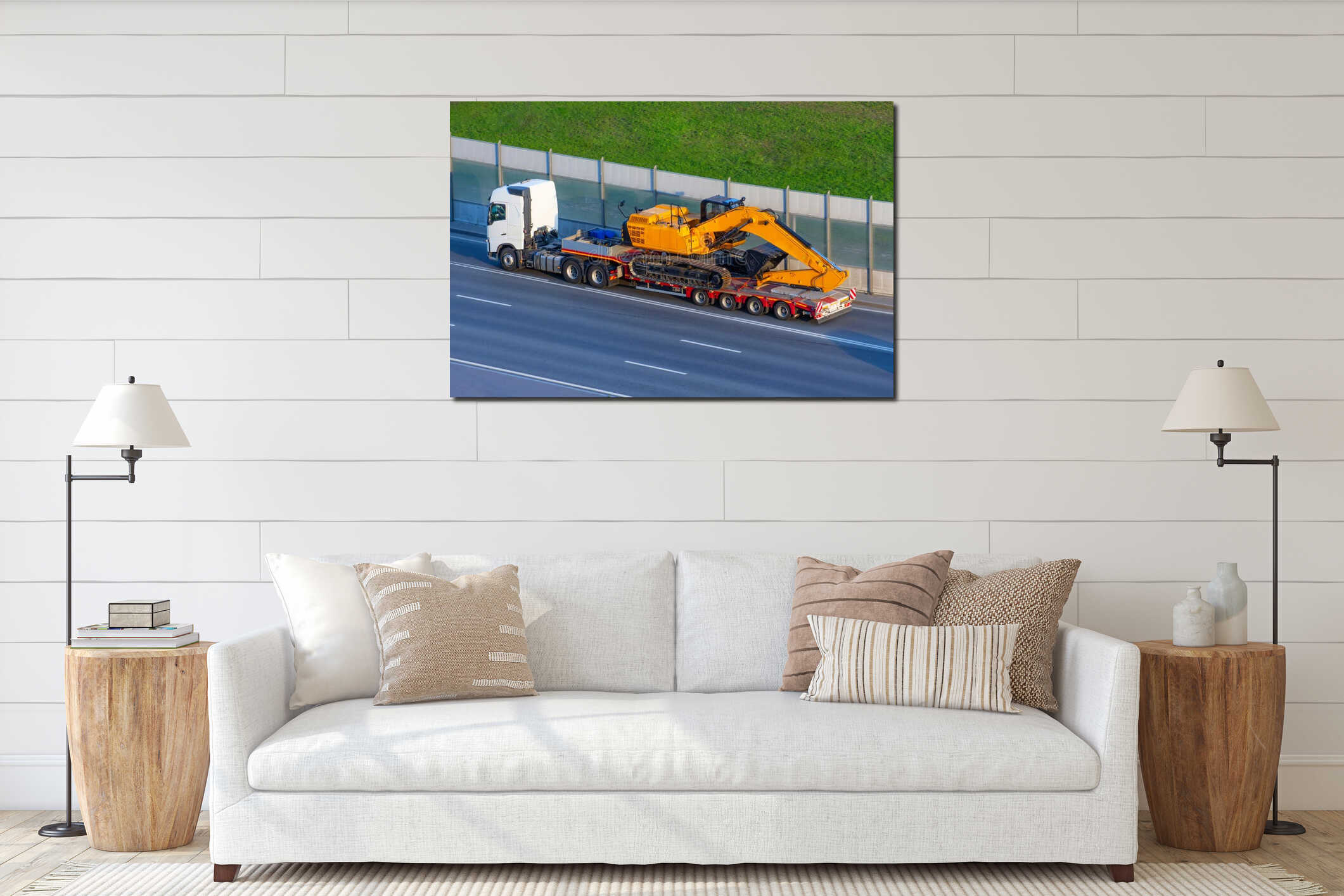 Heavy new yellow excavator on transportation truck with long trailer platform on the highway in the city interior mockup