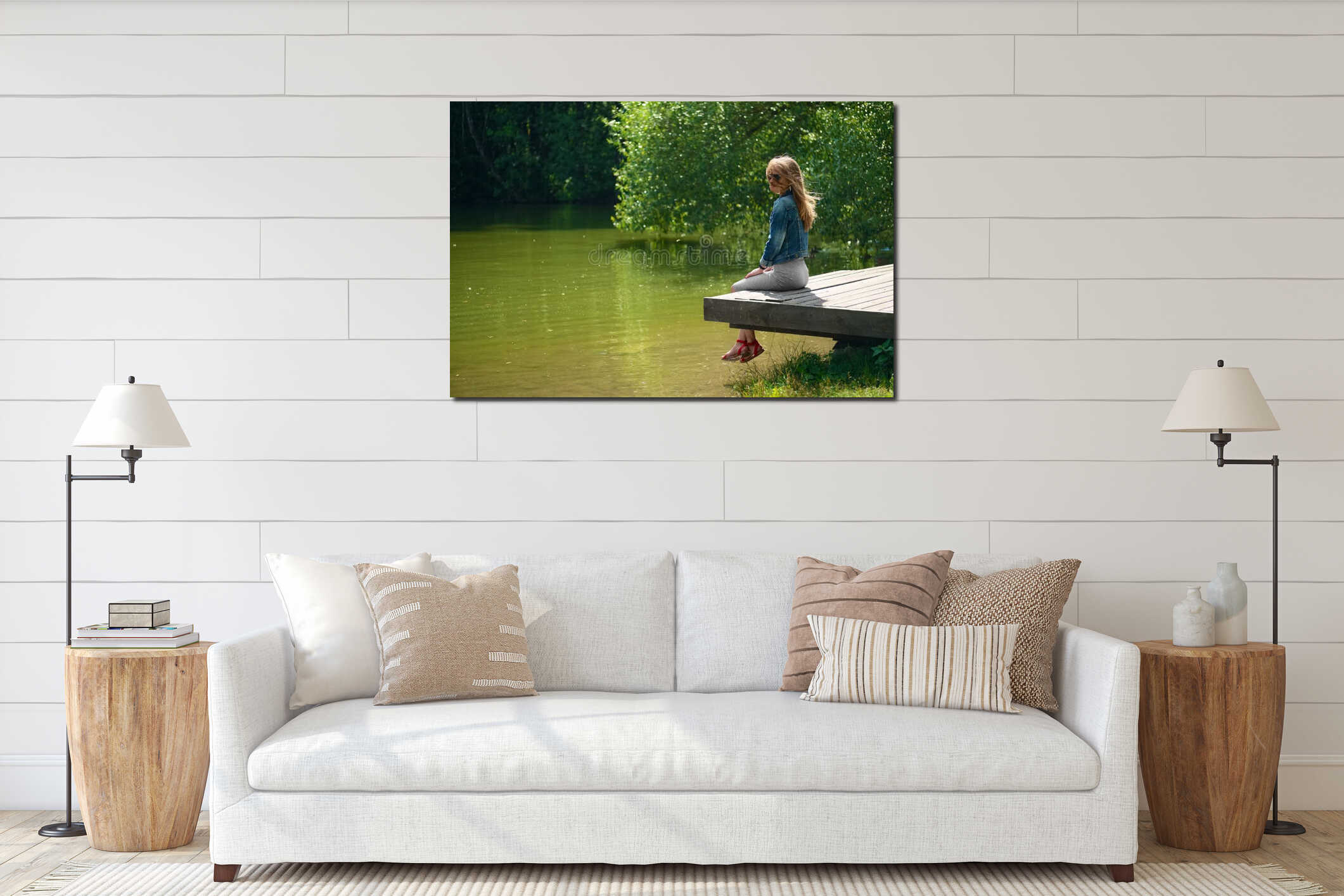 Side view of dreaming girl sitting on wooden pier on river bank interior mockup