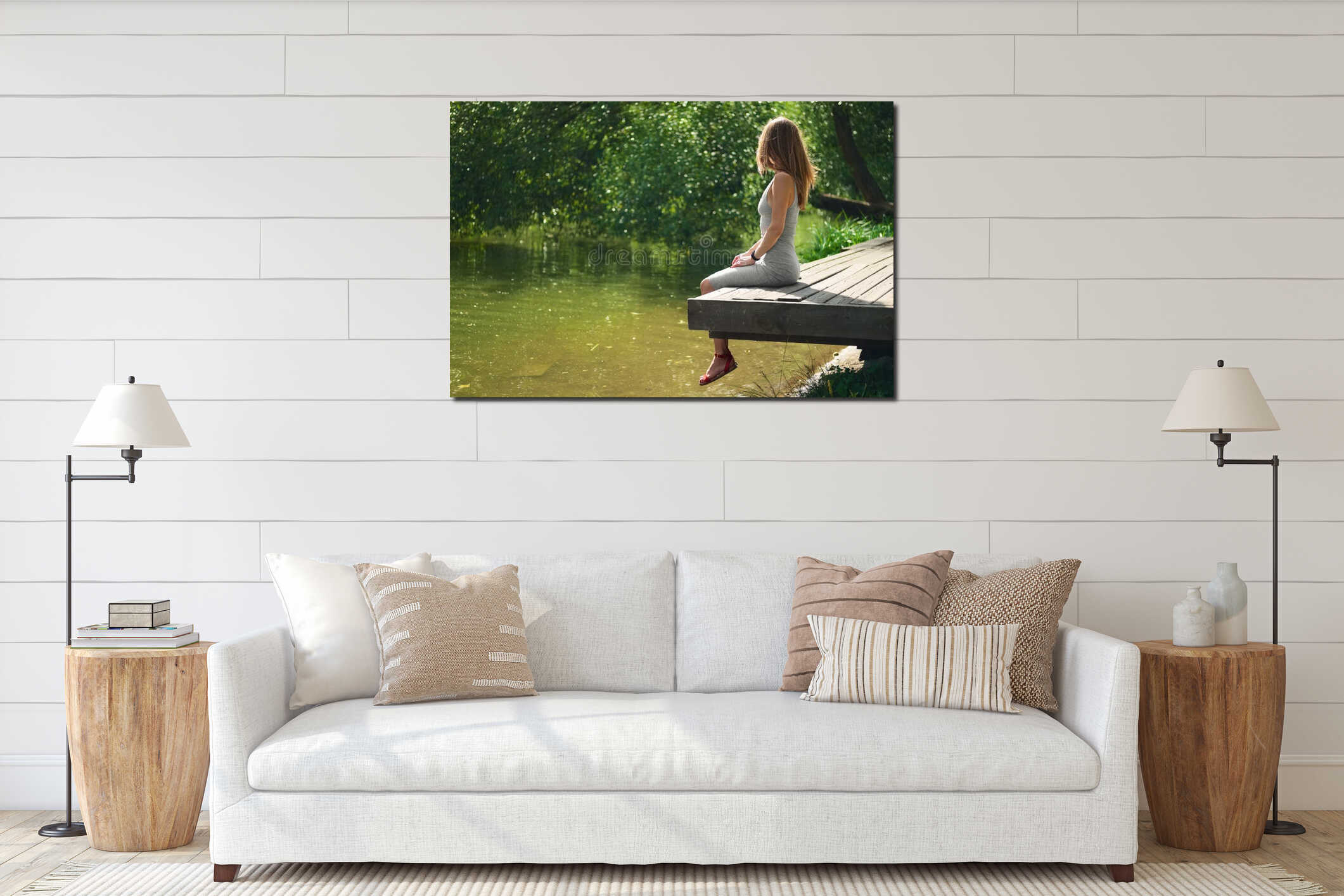 Side view of dreaming girl sitting on wooden pier on river bank interior mockup