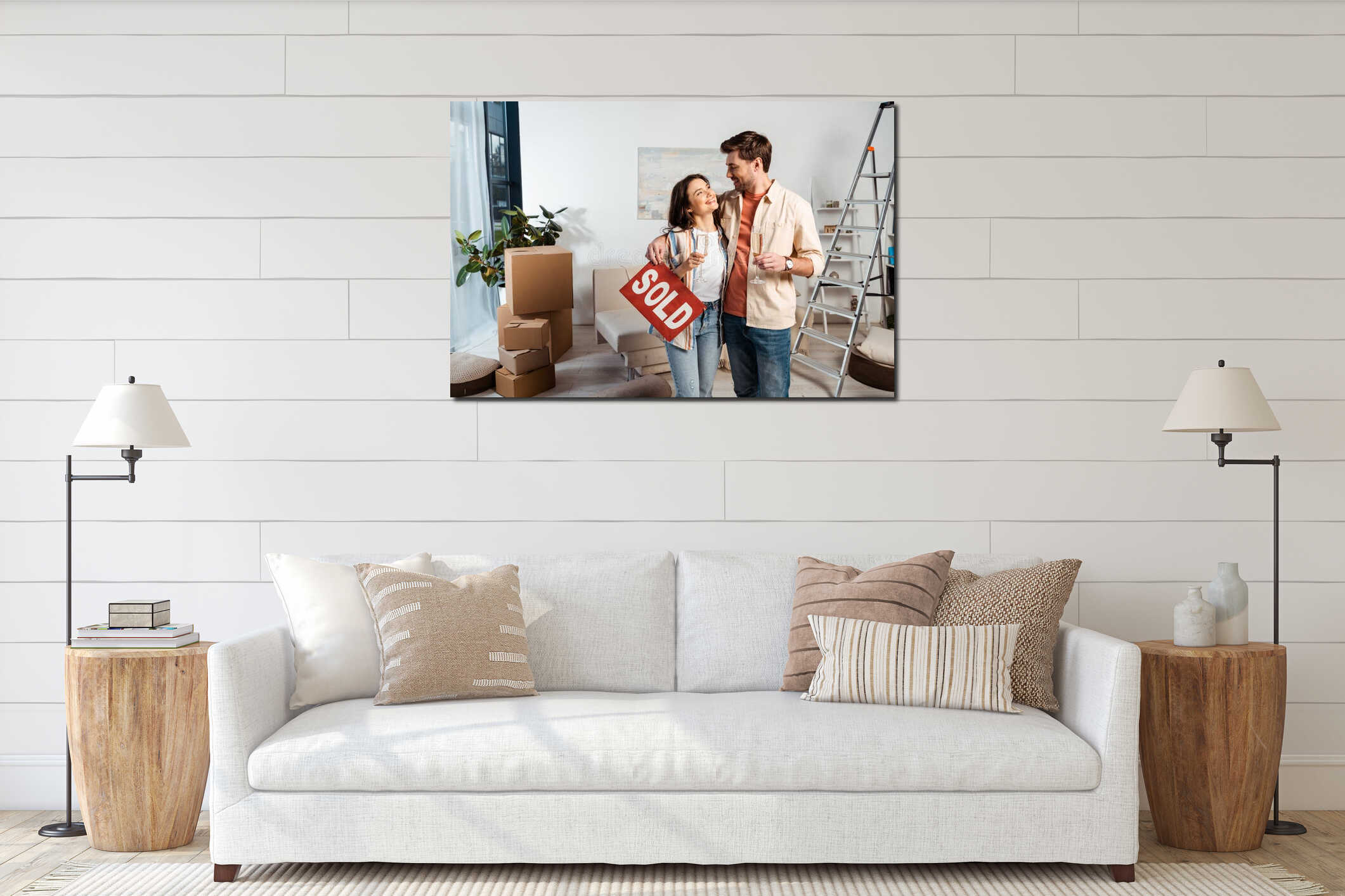 Positive couple holding glasses of champagne interior mockup