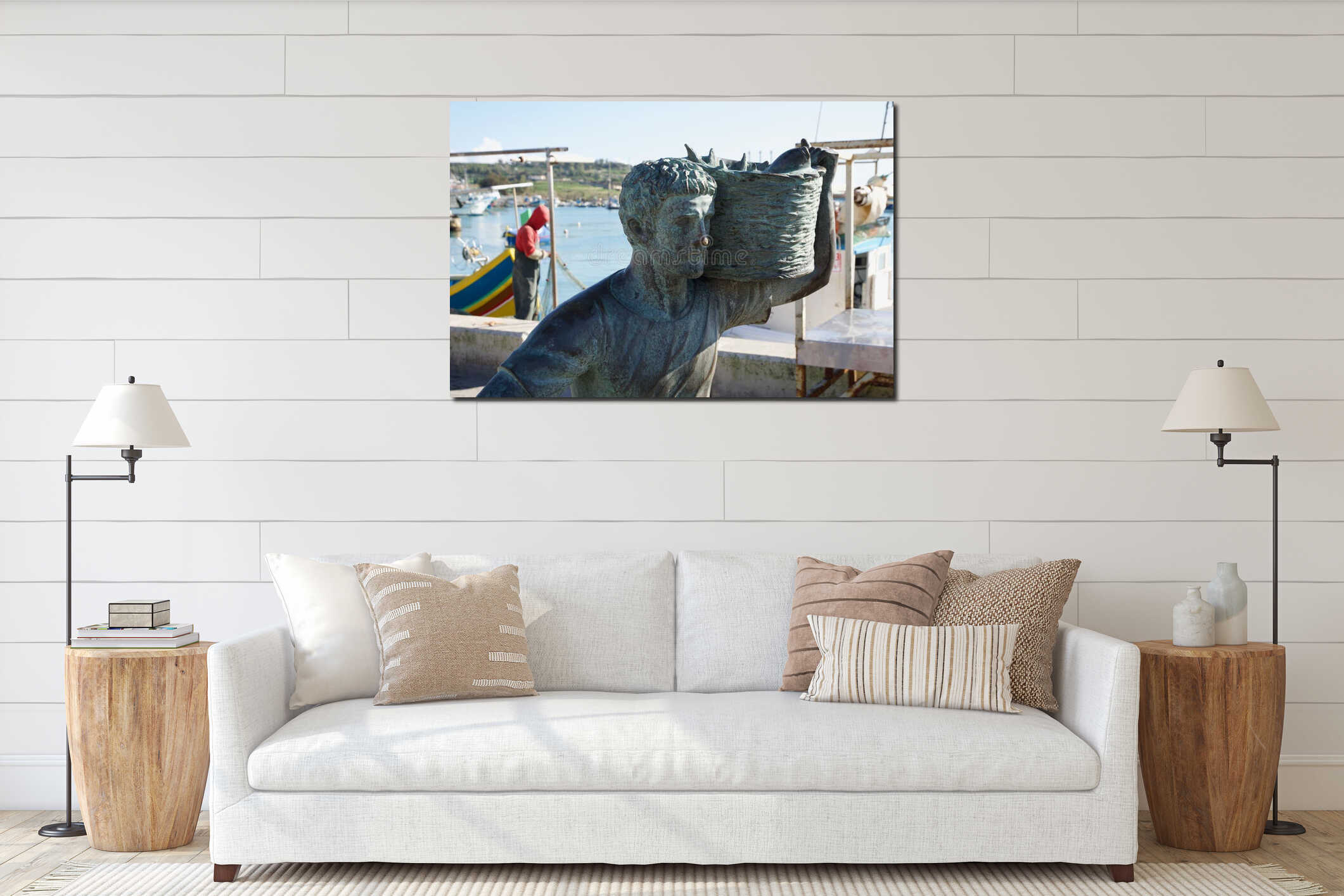 MARSAXLOKK, MALTA - JAN 02sn, 2020: Fisher mam sculpture at Marsaxlokk fish market is a very popular attraction outdoor interior mockup