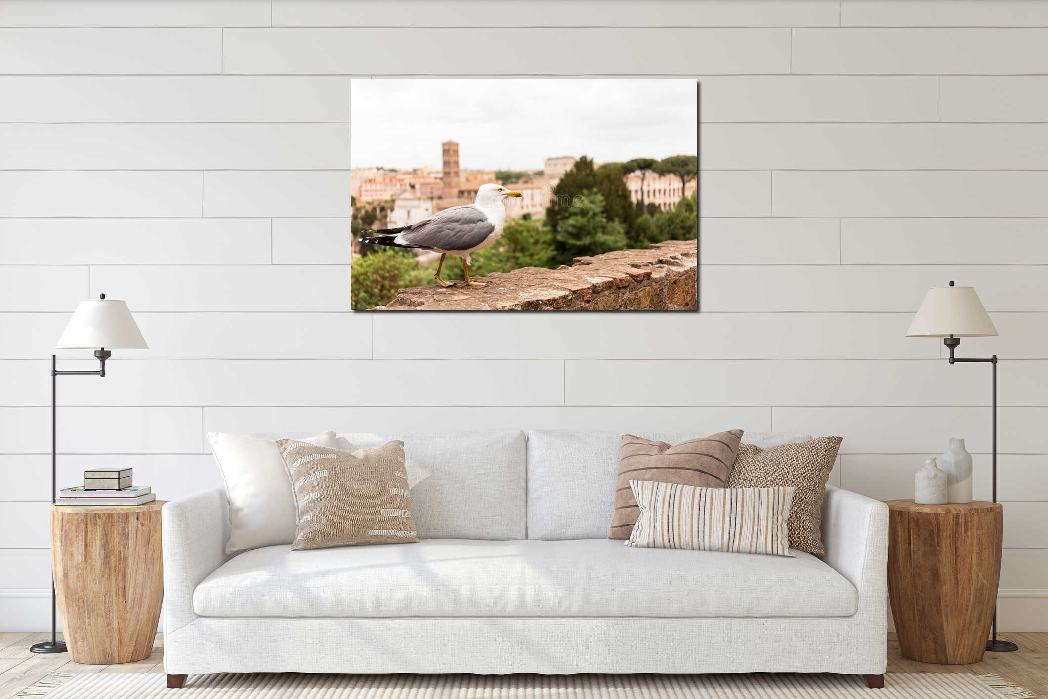 Seagull on wall in front of trees and buildings in rome interior mockup