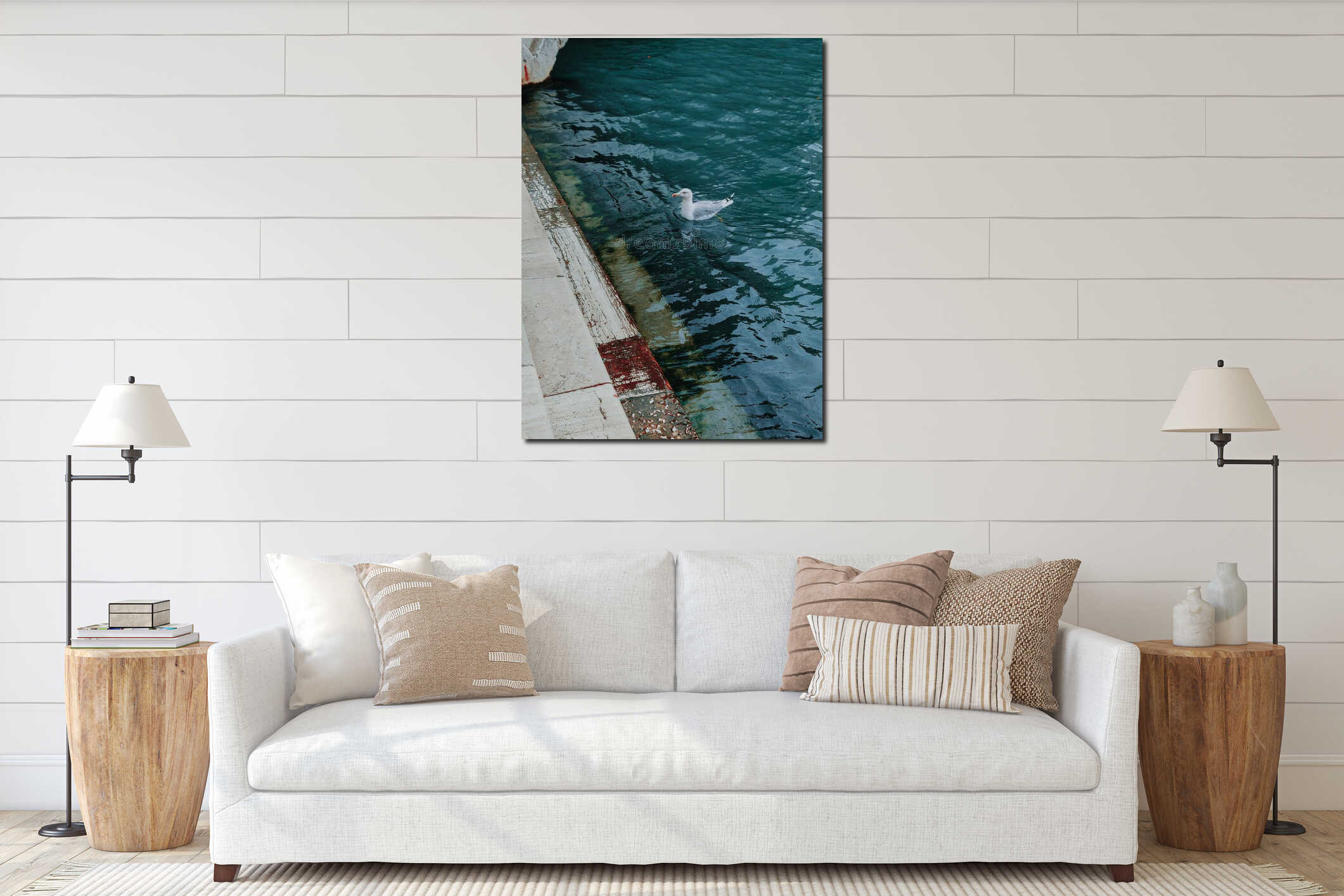 Vertical shot of a white seagull swimming in a pond interior mockup