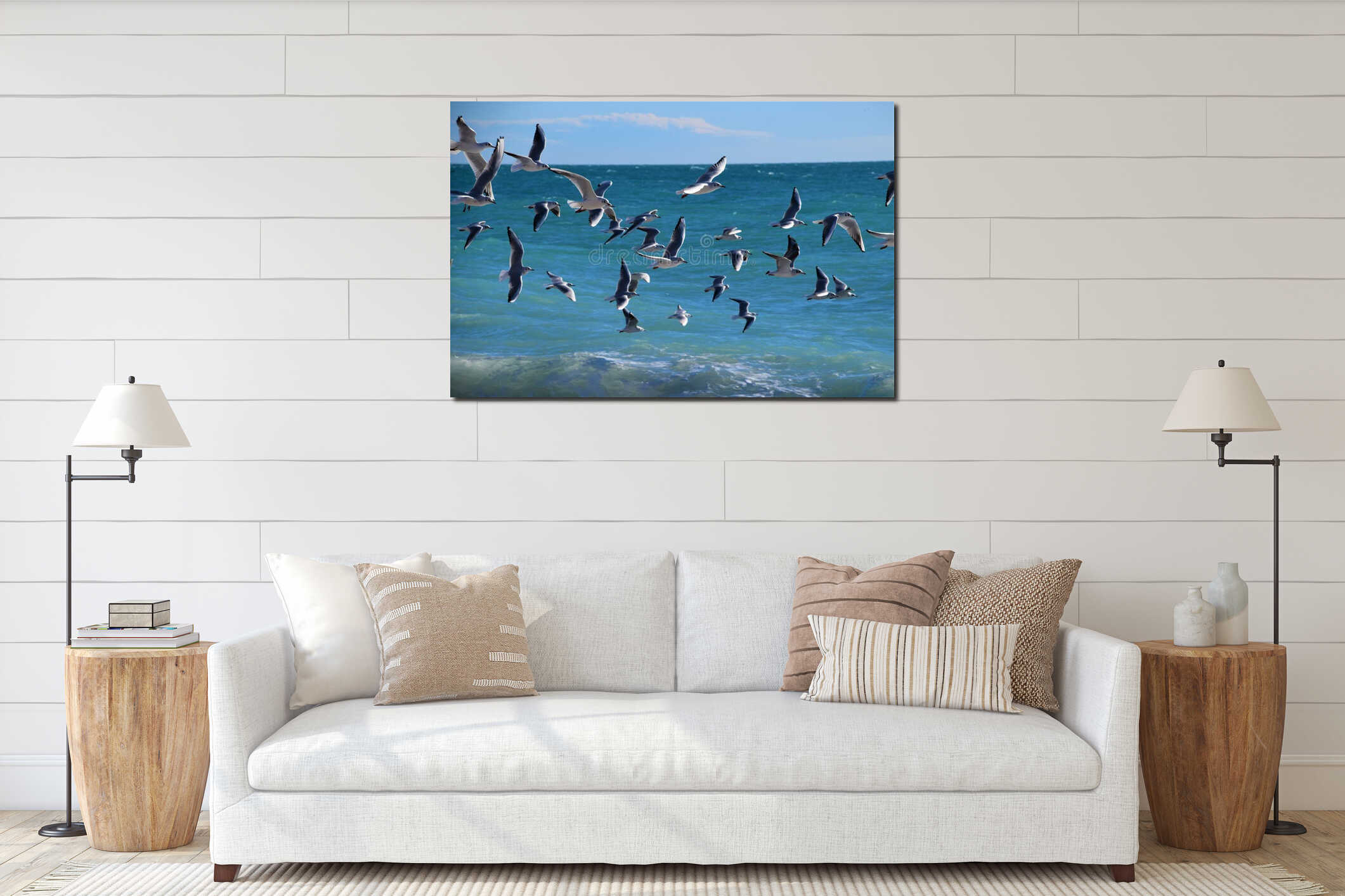 Large flock of seagulls flying over the sea interior mockup