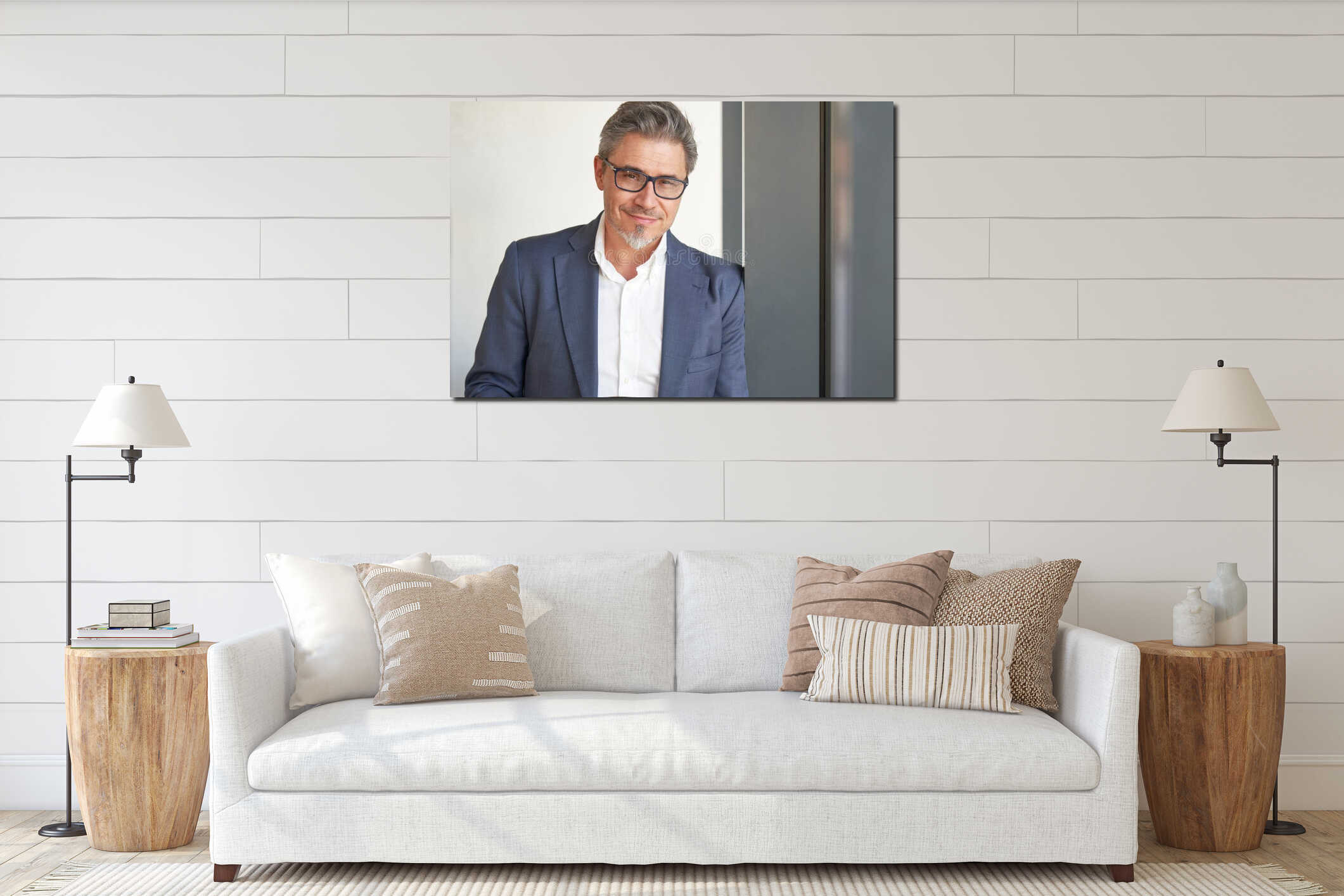 Portrait of happy handsome man wearing glasses, looking at camera. Confident businessman in suit, using tablet interior mockup