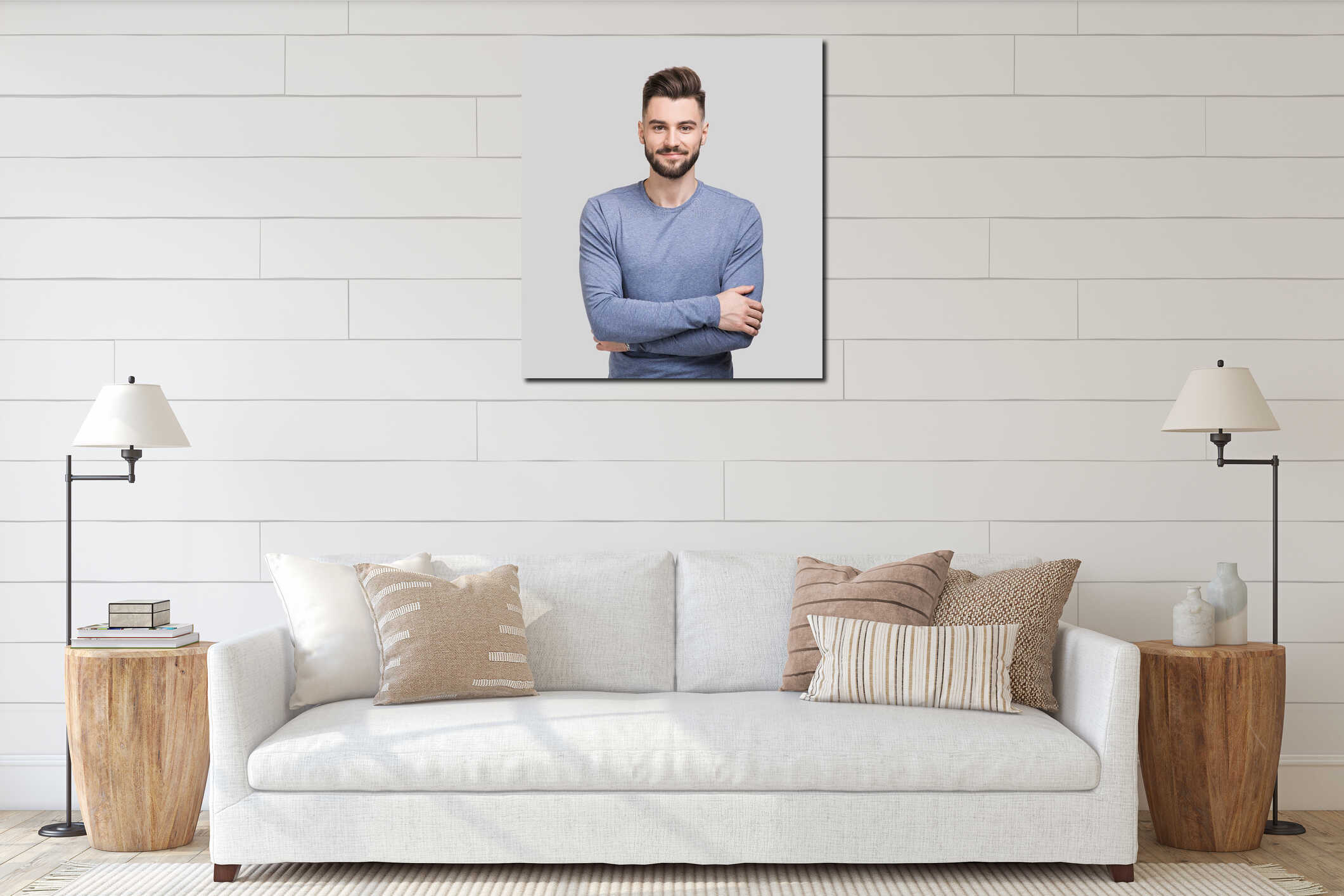 Portrait of cheerful smiling young man with folded arms. interior mockup