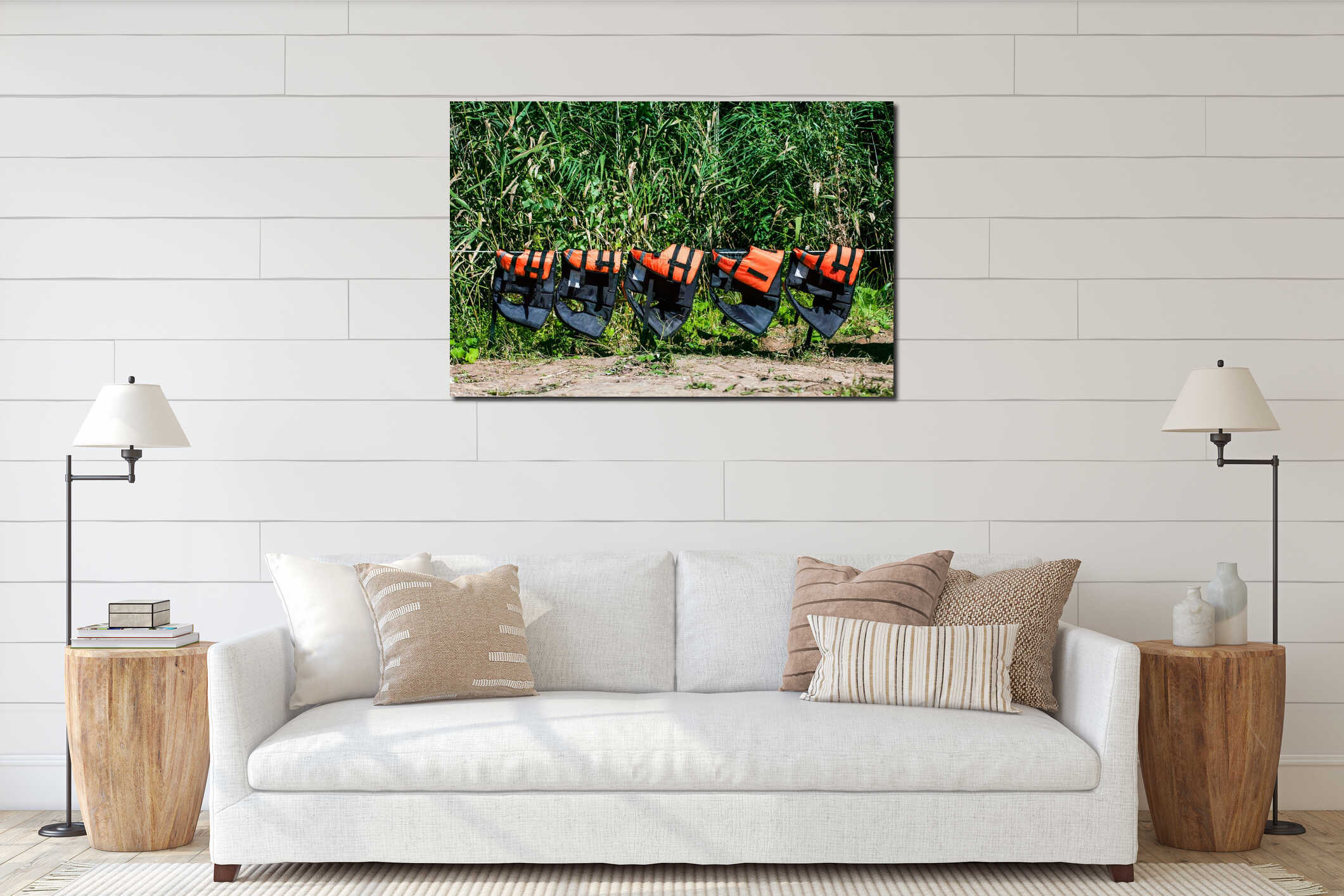 Life jackets hang on a rope on the shore against the backdrop of greenery. Safe gear interior mockup