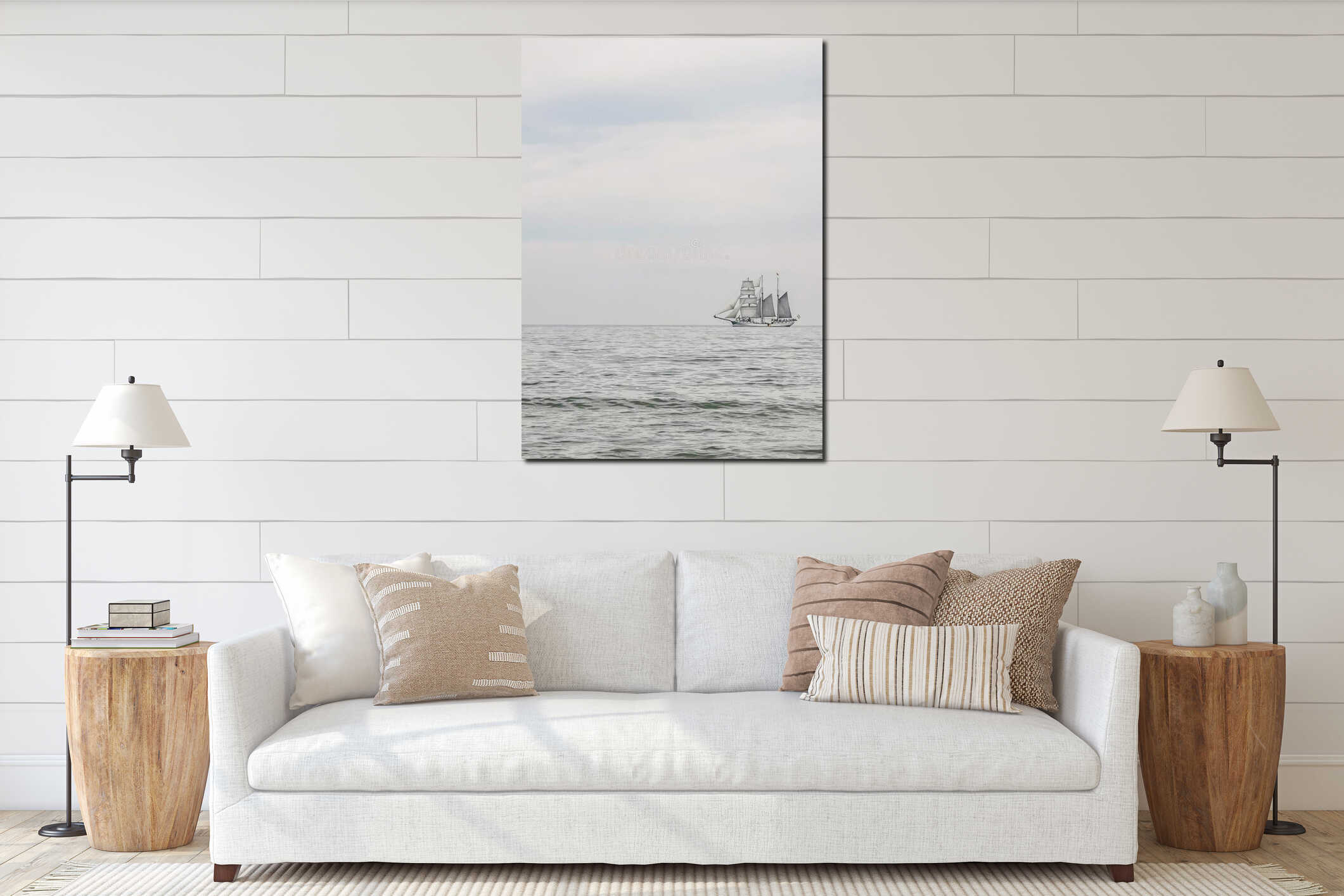 Vertical shot of a ship with sails sailing across the ocean interior mockup