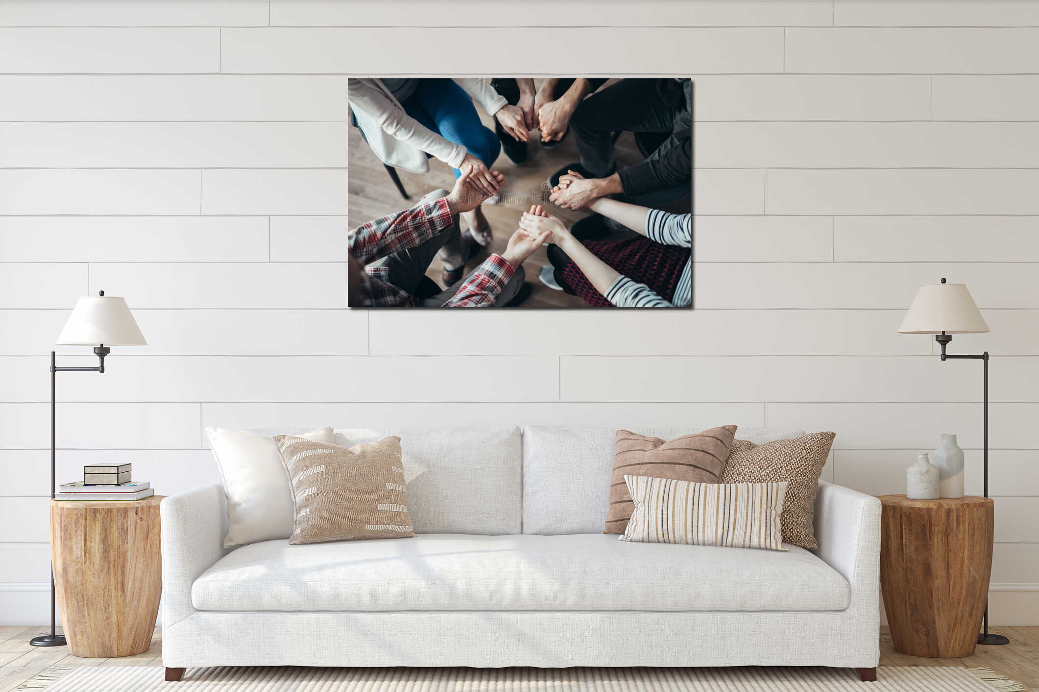 Close-up of hands of people sitting in a circle during a therapy interior mockup