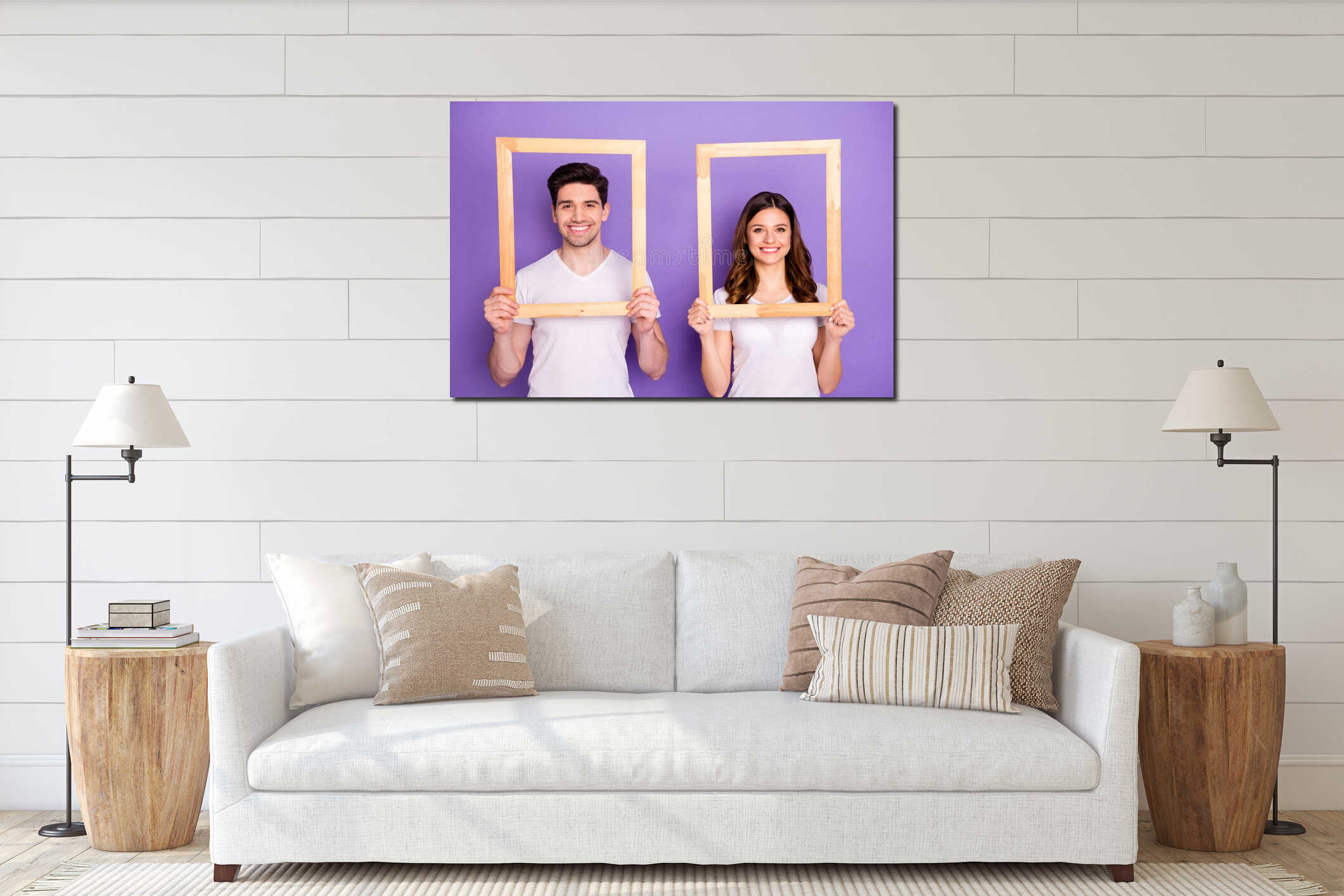 Portrait of cheerful man woman hold wooden picture frame wear white t-shirt casual style isolated over violet color interior mockup