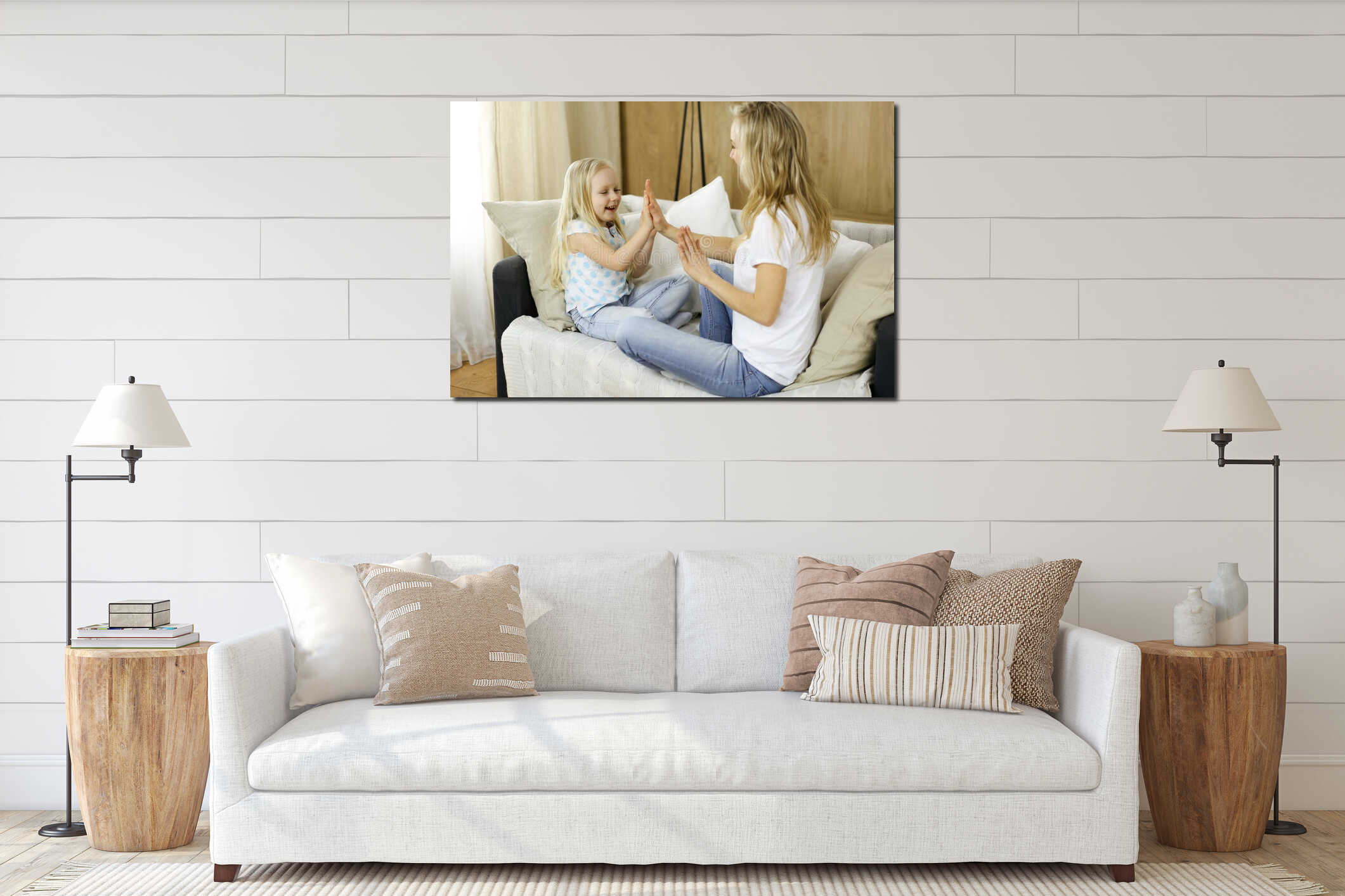 Happy family. Blonde young mother playing and hugging with her cute daughter. Motherhood concept interior mockup
